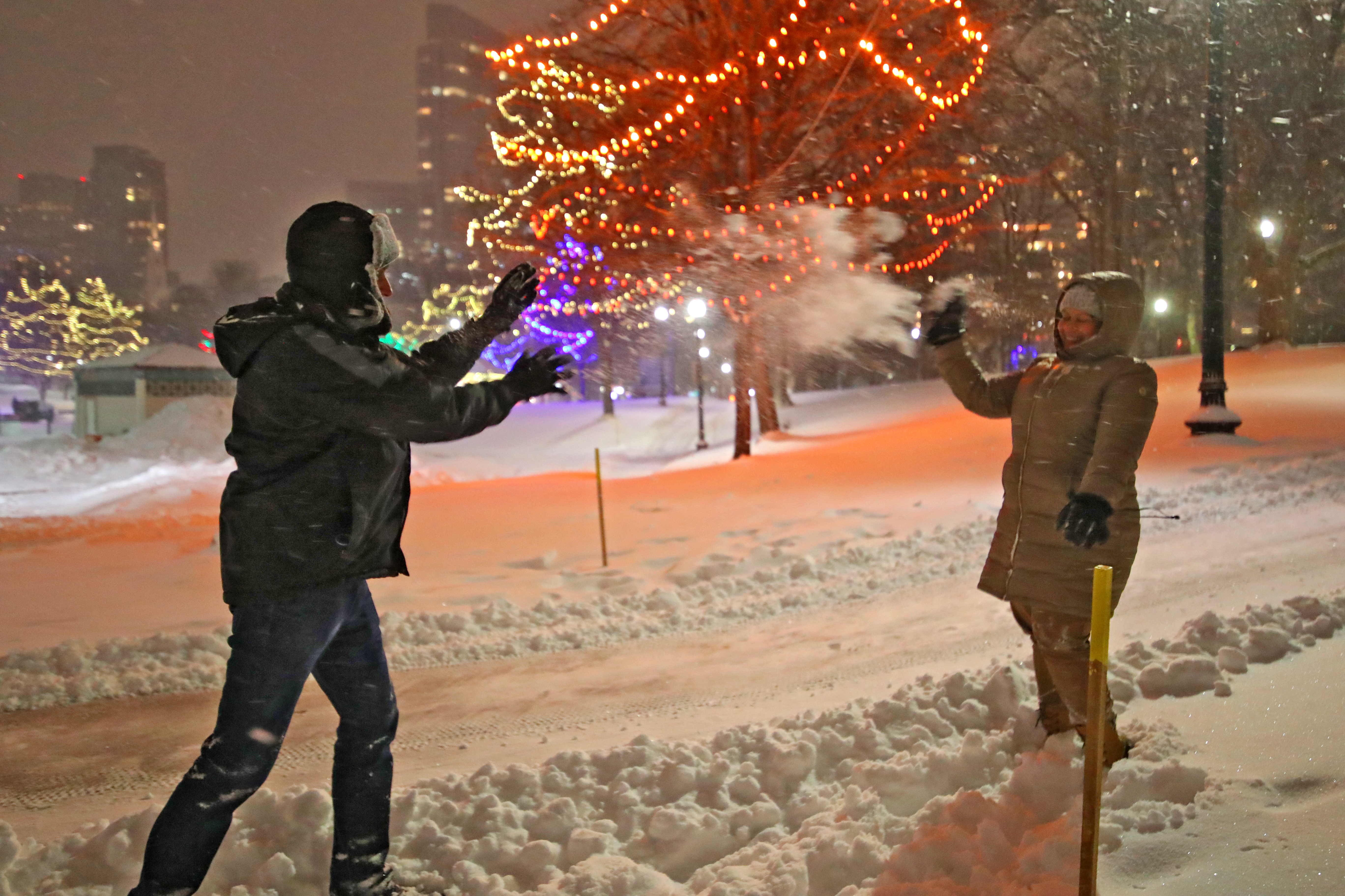 Sagar Bhatt (left) and his fiancée, Megha Parikh, had a snowball fight on Boston Common.