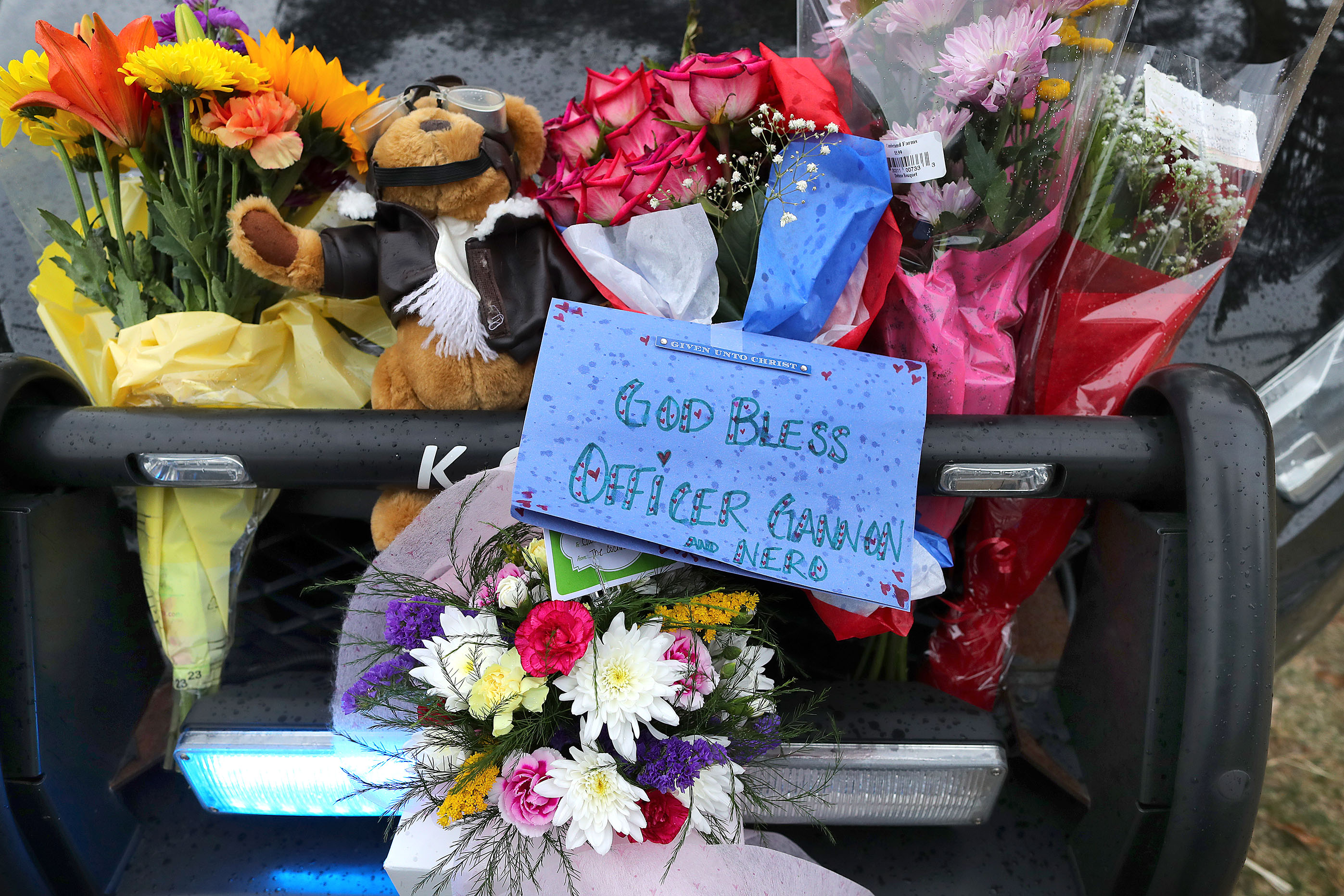 People left flowers at the Yarmouth Police Station.