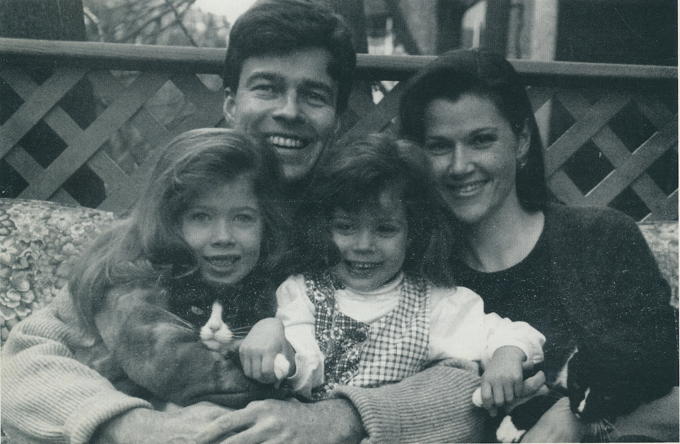 Tom and Laurie with their daughters and cats in a 1995 Christmas card.
