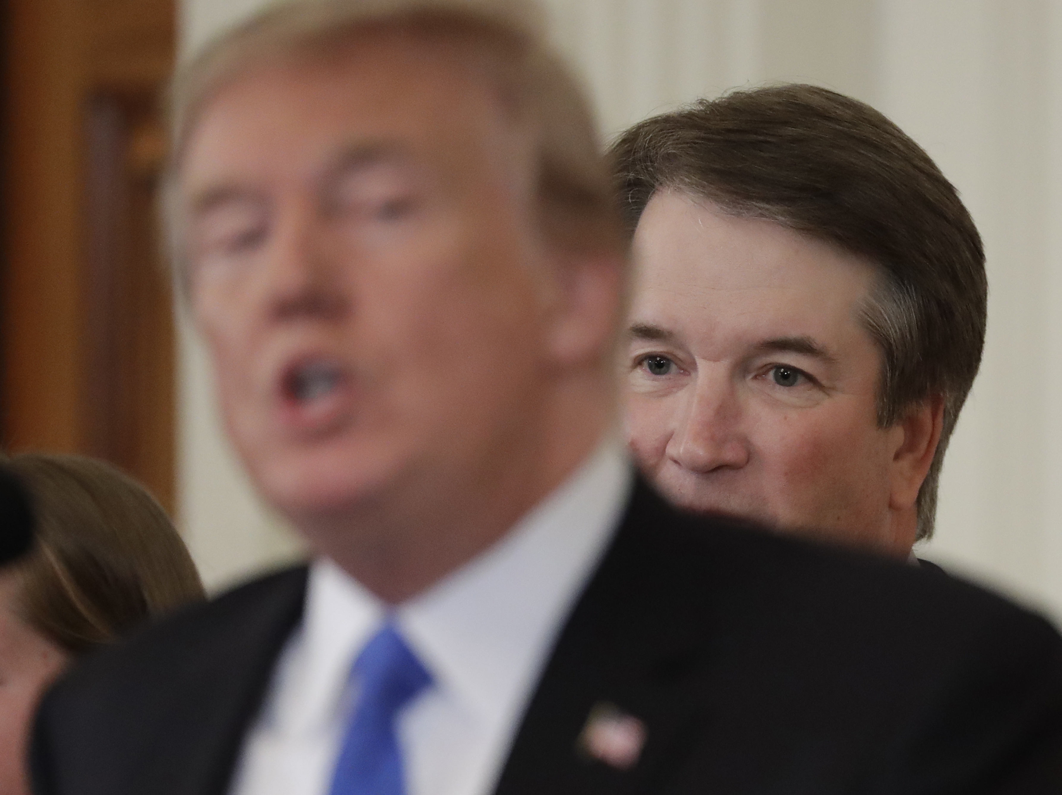 President Trump spoke, as Judge Brett Kavanaugh his Supreme Court nominee, listened in the East Room of the White House on July 9.