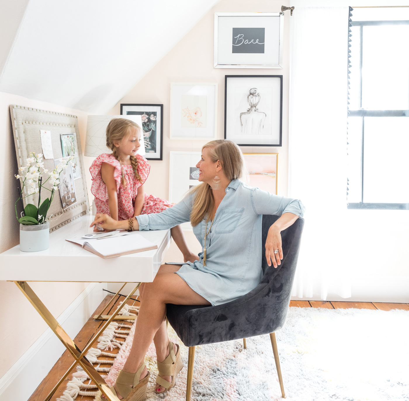 Homeowner and designer Jenny Minns in her home office with her daughter, Isabelle.