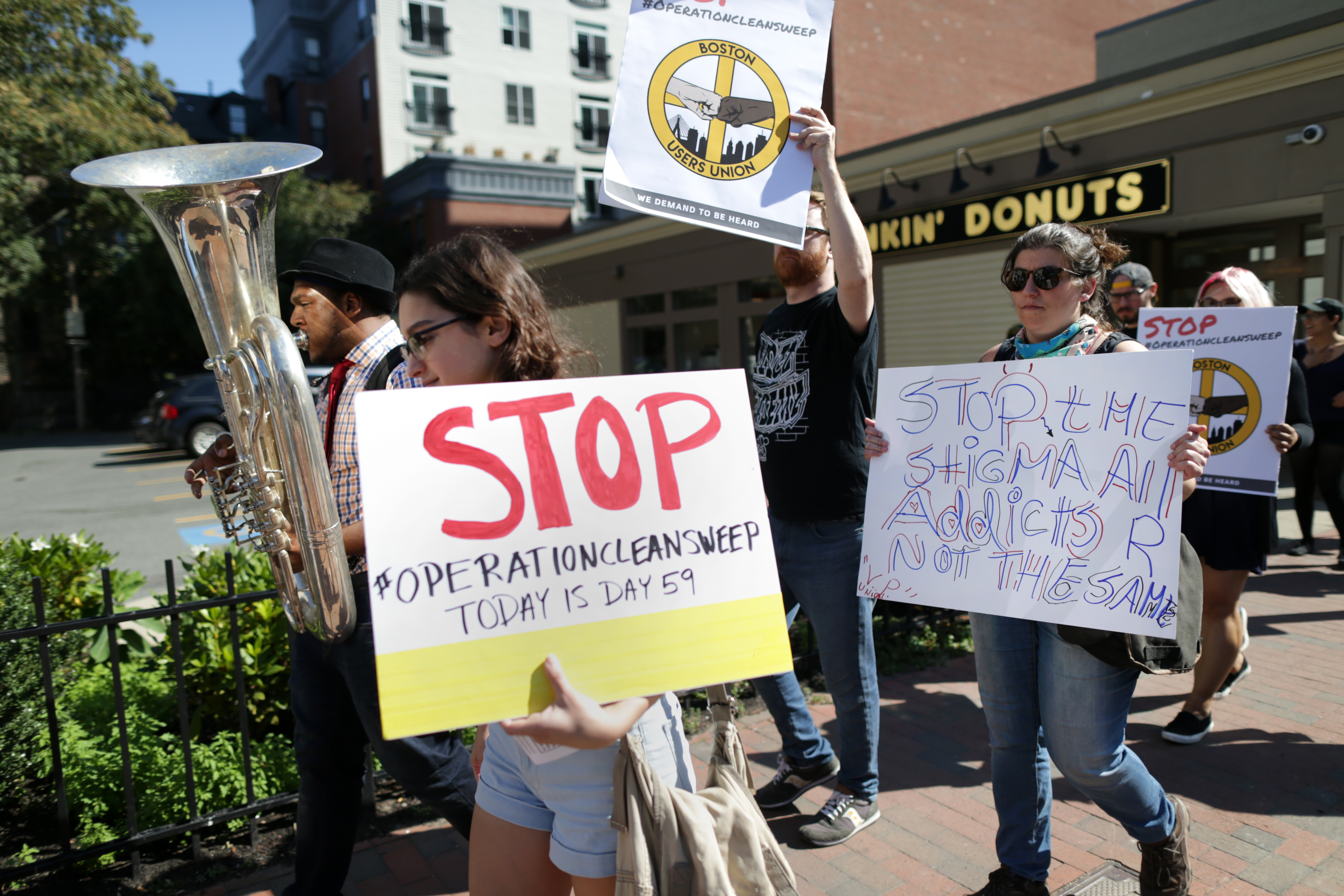 Protesters passed through the intersection of Massachusetts Avenue and Washington Street.
