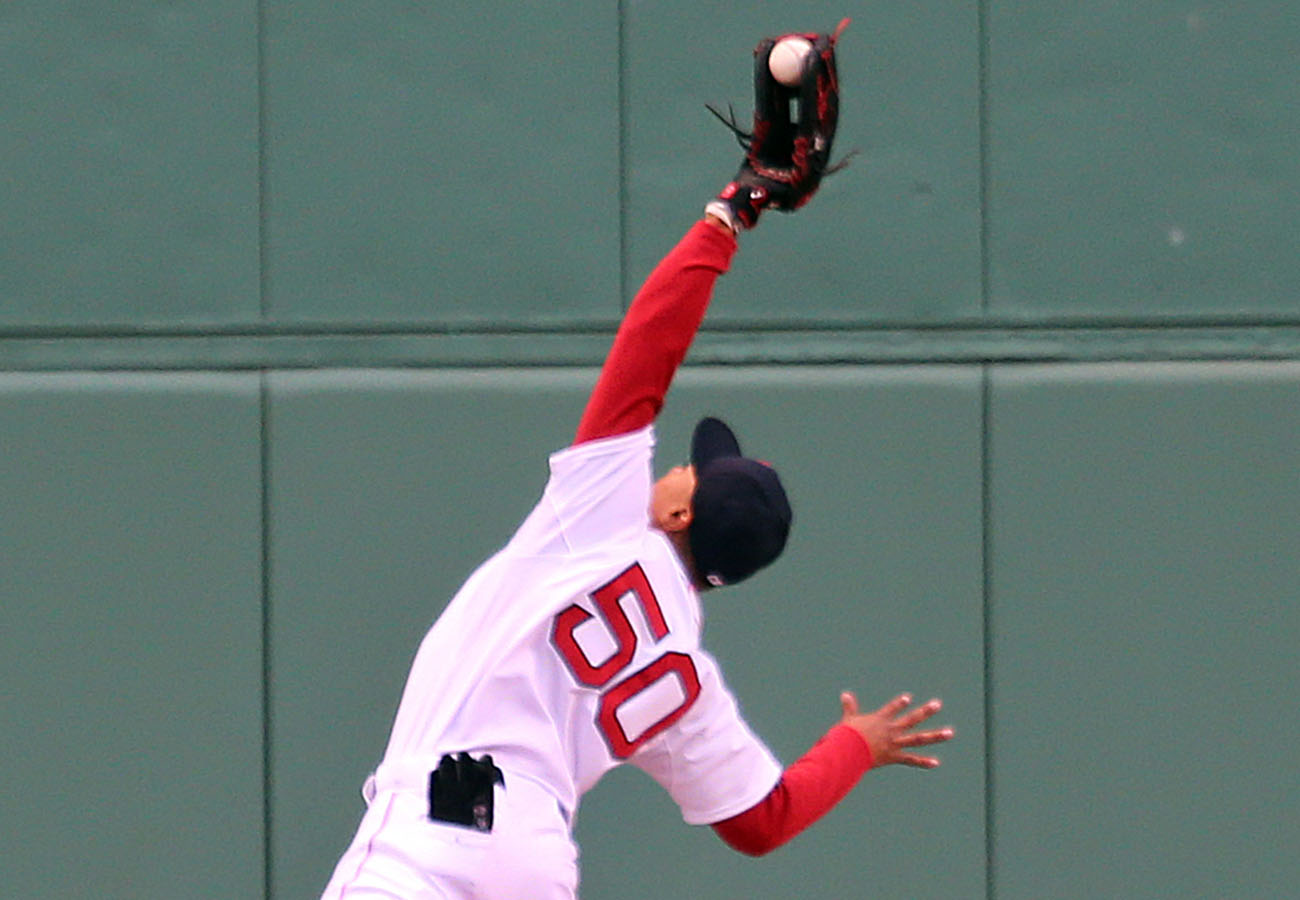 Red Sox center fielder Mookie Betts made a great over-the-shoulder catch on a third-inning fly ball to center by Devon Travis.
