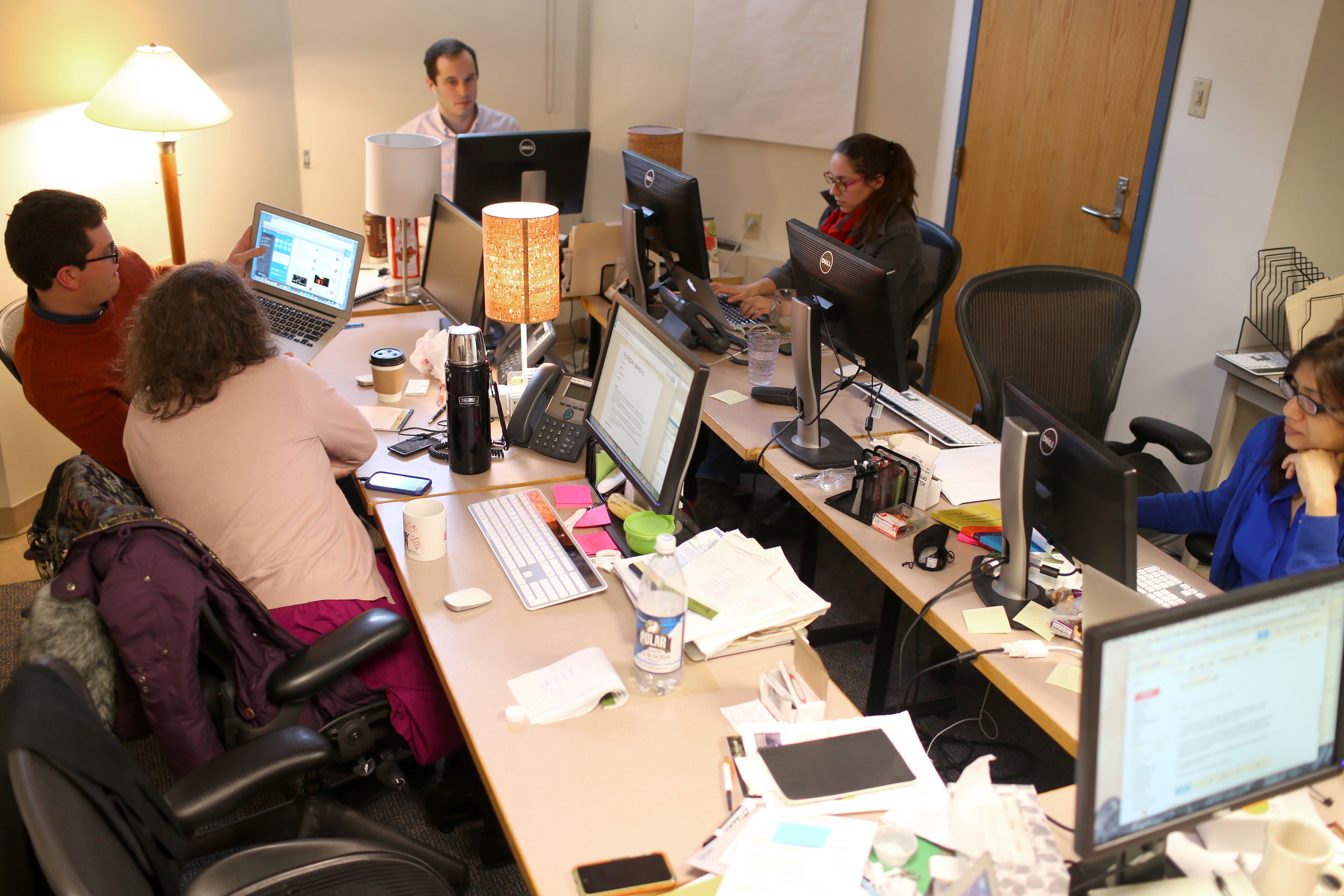 In their basement office at Boston University, journalists work on the start-up US edition of The Conversation, a scholarly contribution to the news cycle.