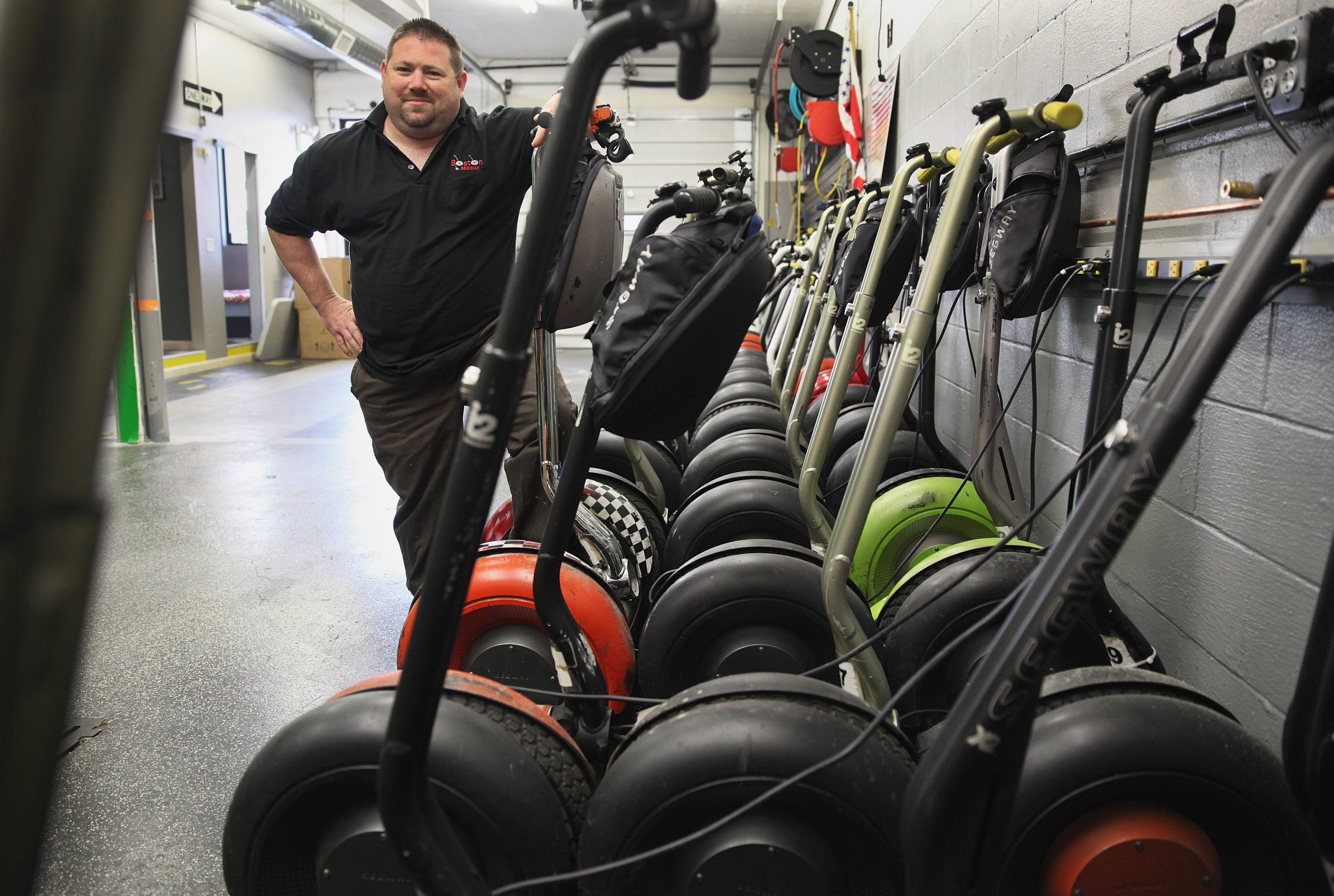 Boston By Segway’s Allan Danley said his firm has amassed $200,000 in violations, which he vows not to pay.