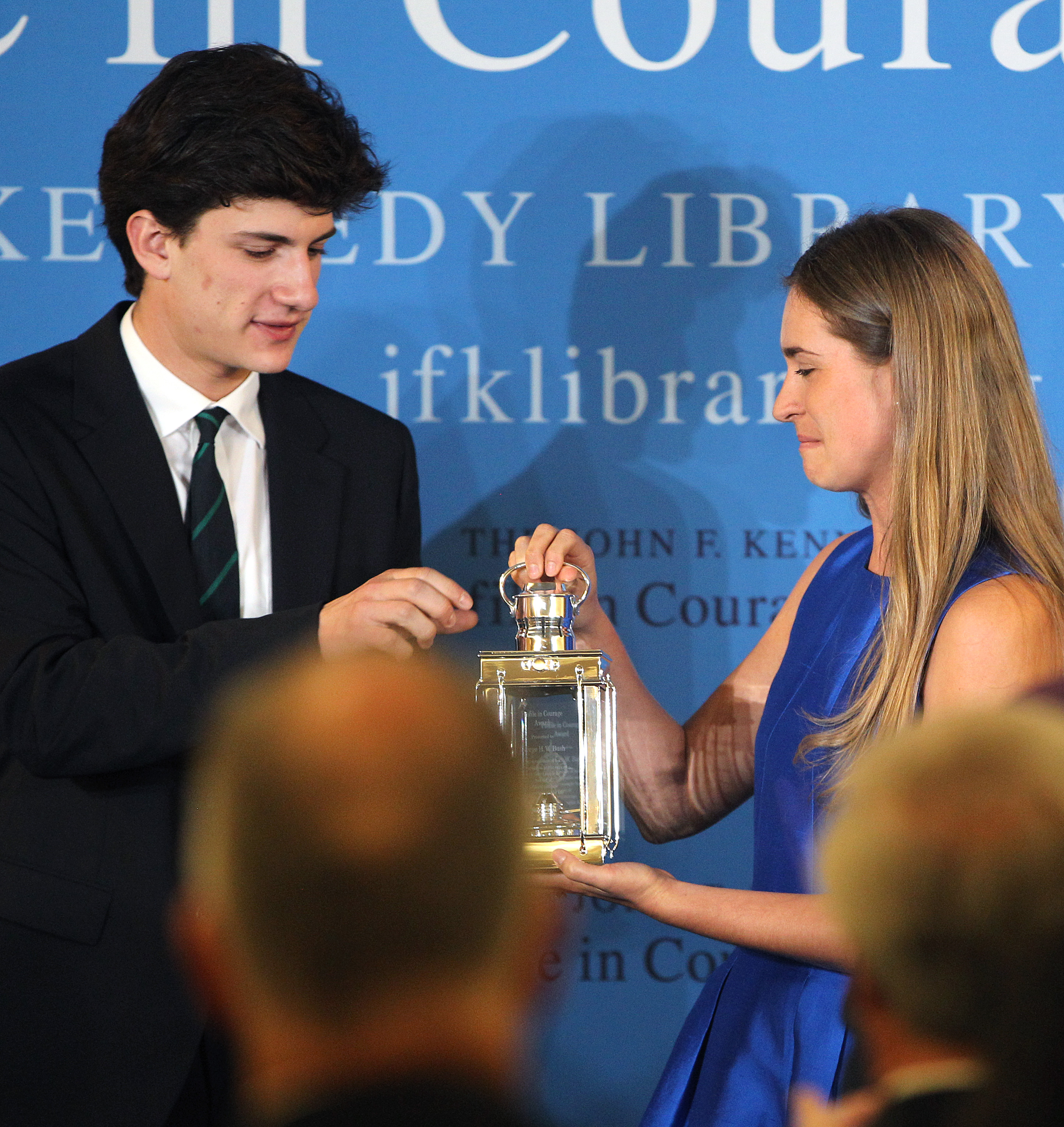 Jack Schlossberg, grandson of President Kennedy, gave the award to Lauren Bush, granddaughter of President George H.W. Bush, at the Kennedy library in Dorchester.