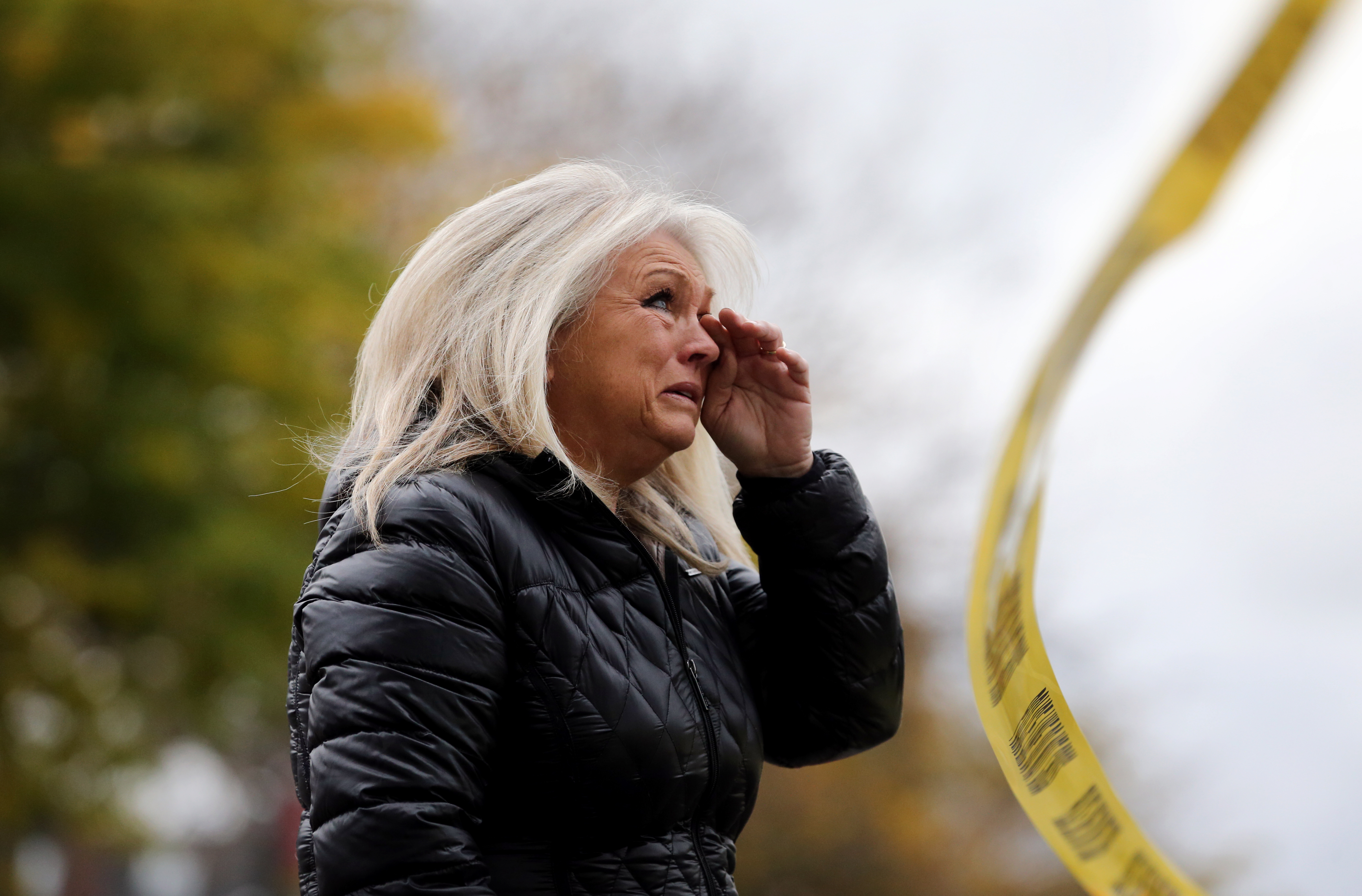 Parishioner Kris Rankin wiped a tear from her eye while looking at the fire gutted First Baptist Church.