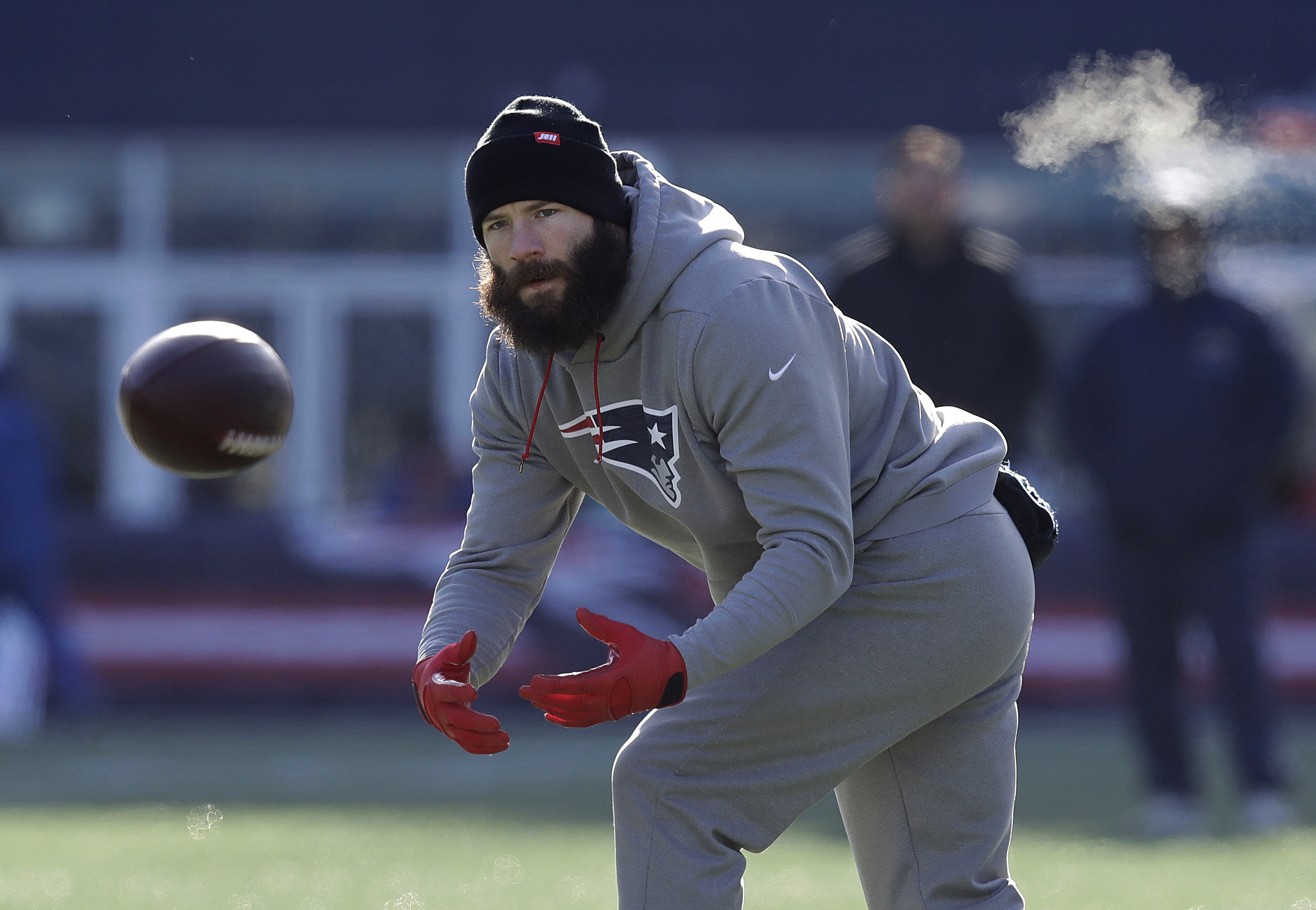 Wide receiver Julian Edelman warms up.
