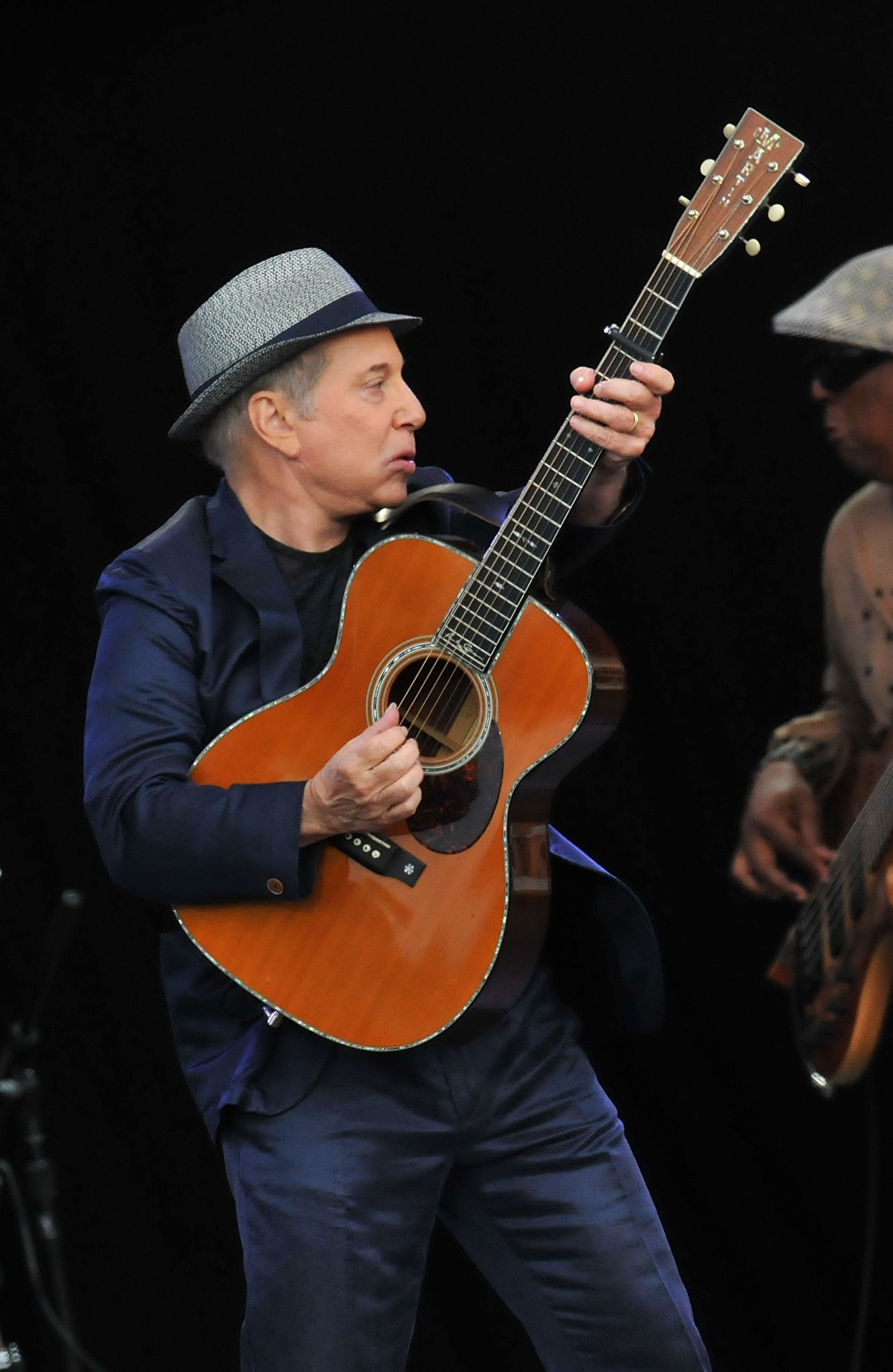 <span id="U833719963245tH" style=" font-family: 'PoynterGothicText Black'; font-weight: normal; font-style: normal; text-transform: uppercase; ;">Paul Simon </span>in London in 2012.