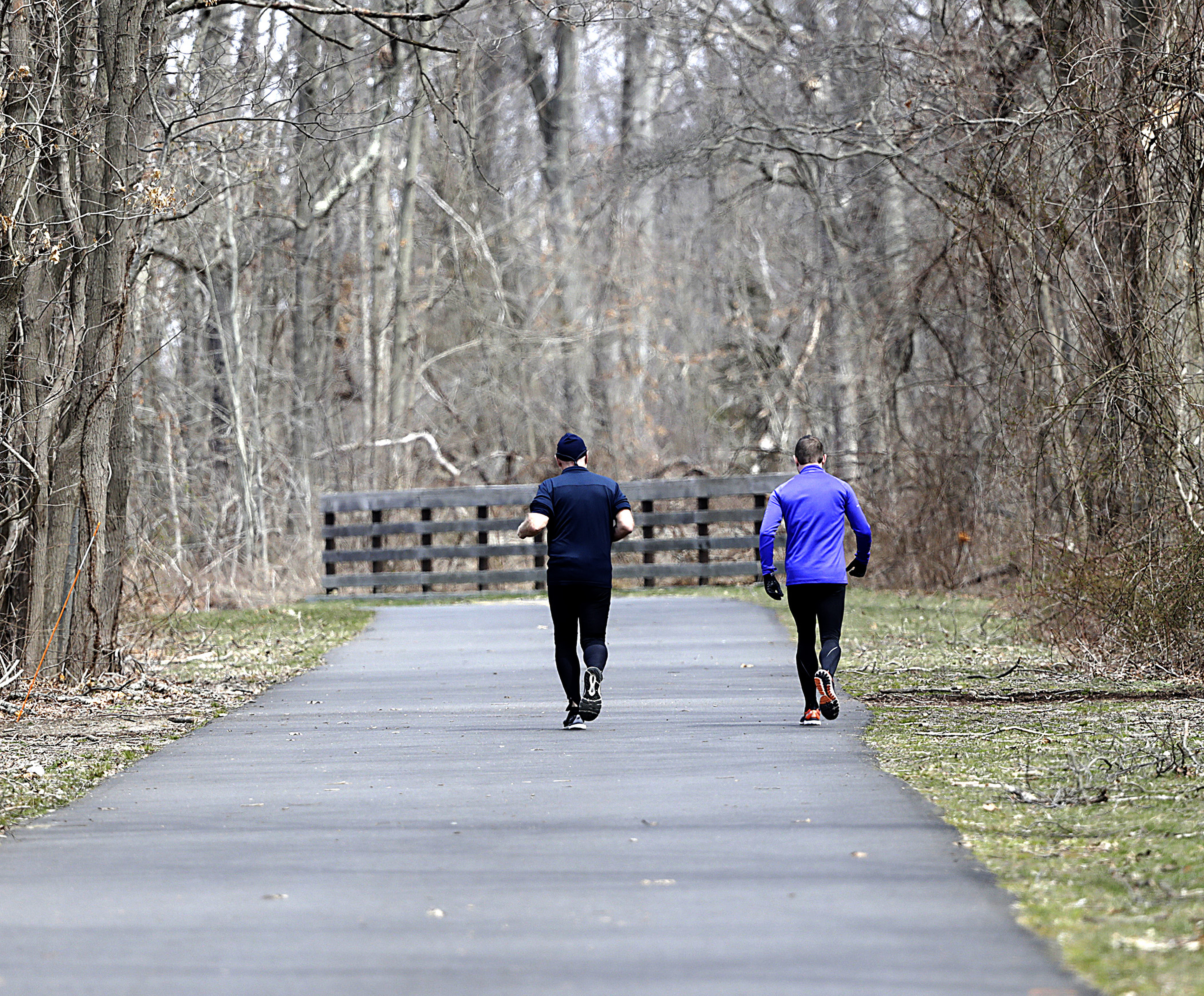 Jamie Schneider (left), 27, was accompanied by his father Allan on his workout at Bethpage State Park in preparation for this year’s Boston Marathon.