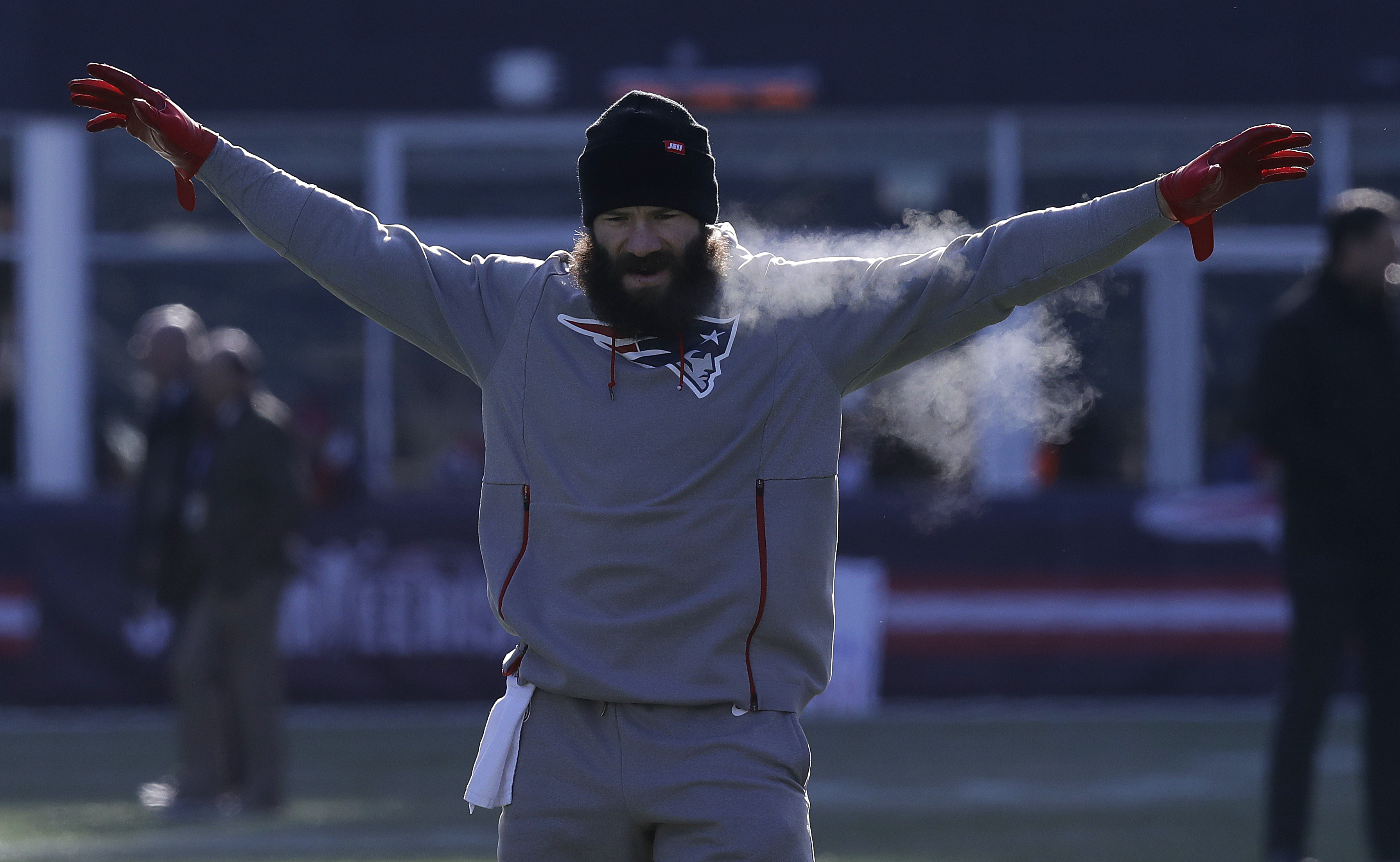 Wide receiver Julian Edelman warms up.
