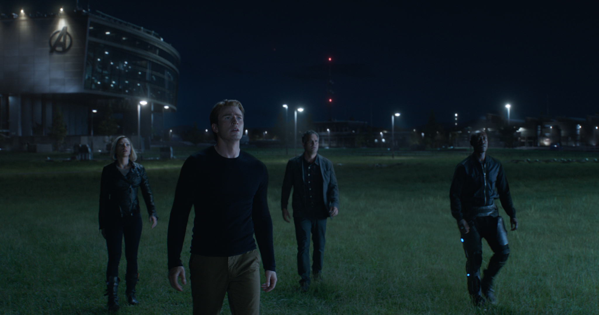 From left to right: Black Widow/Natasha Romanoff (Scarlett Johansson), Captain America/Steve Rogers (Chris Evans), Bruce Banner (Mark Ruffalo), and War Machine/James Rhodes (Don Cheadle).