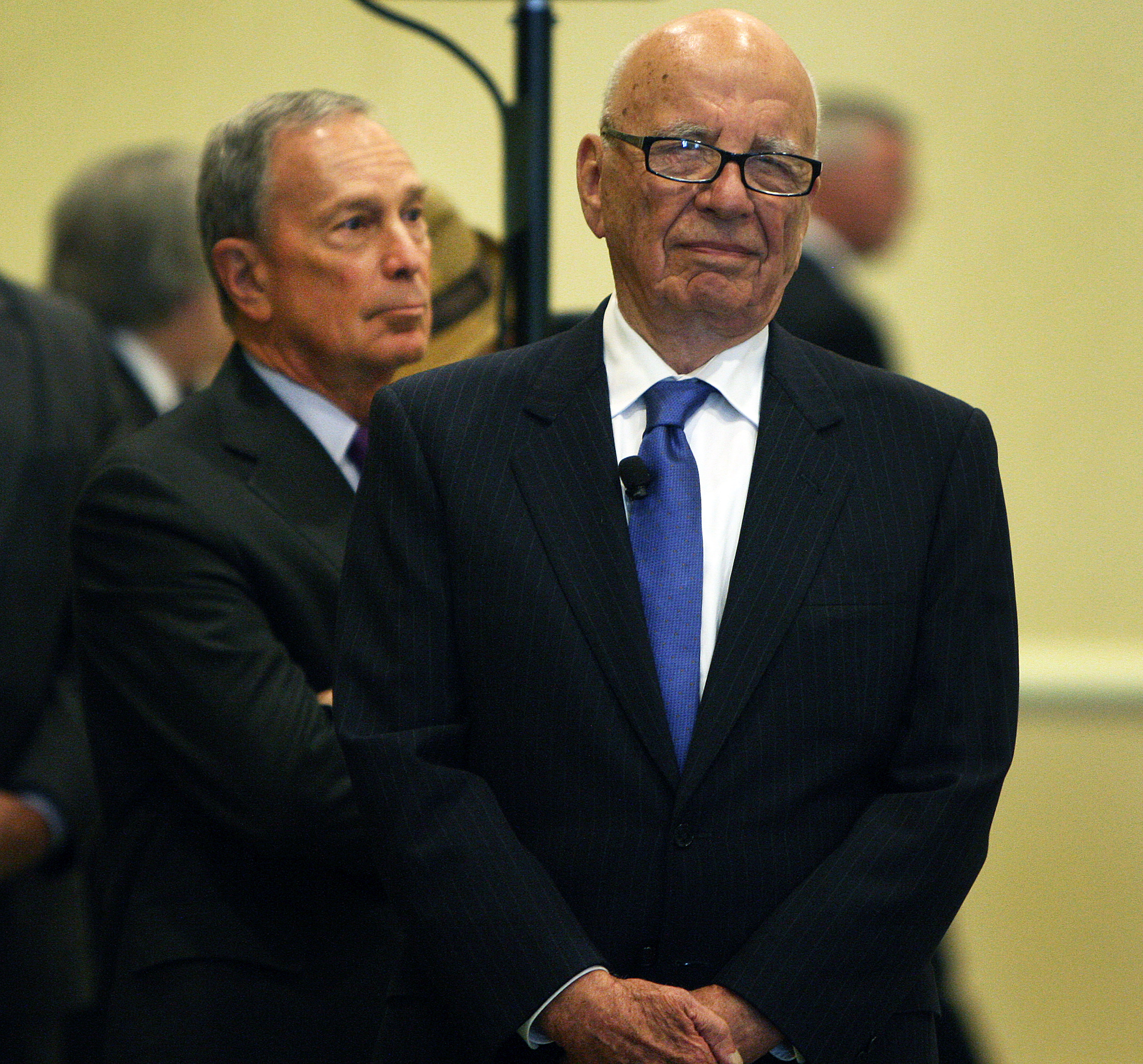 Rupert Murdoch (right) and New York City Mayor Michael Bloomberg (left) took part in a discussion about immigration in Boston Tuesday.