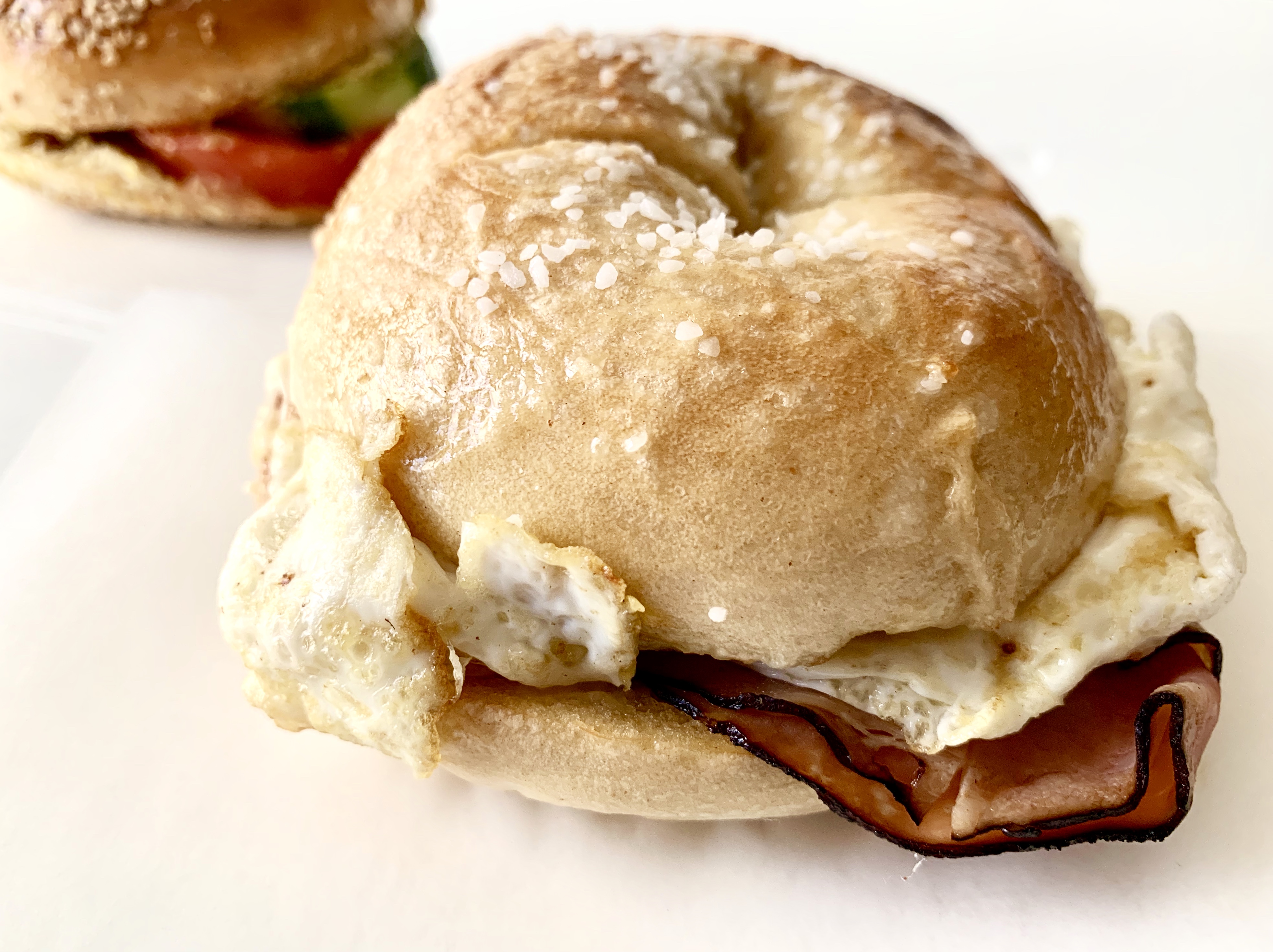 The Just Right bagel at Goldilox’s features an over-easy egg, American cheese, and ham.