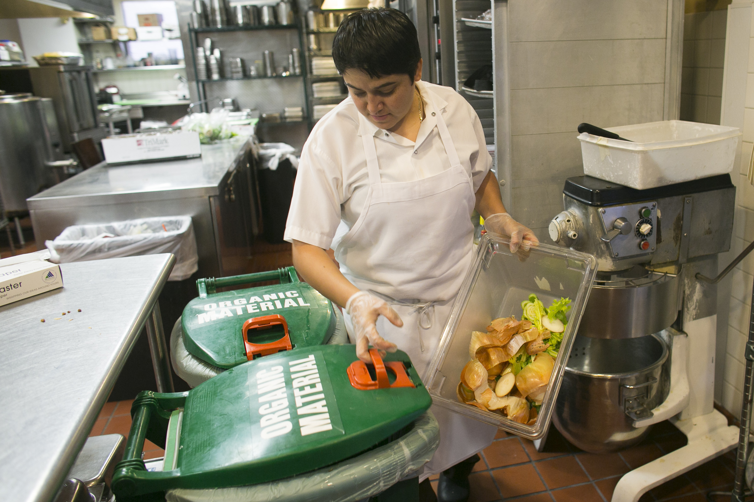 In the kitchen at the Lenox Hotel in Back Bay, Eliza Martinez separates compost.