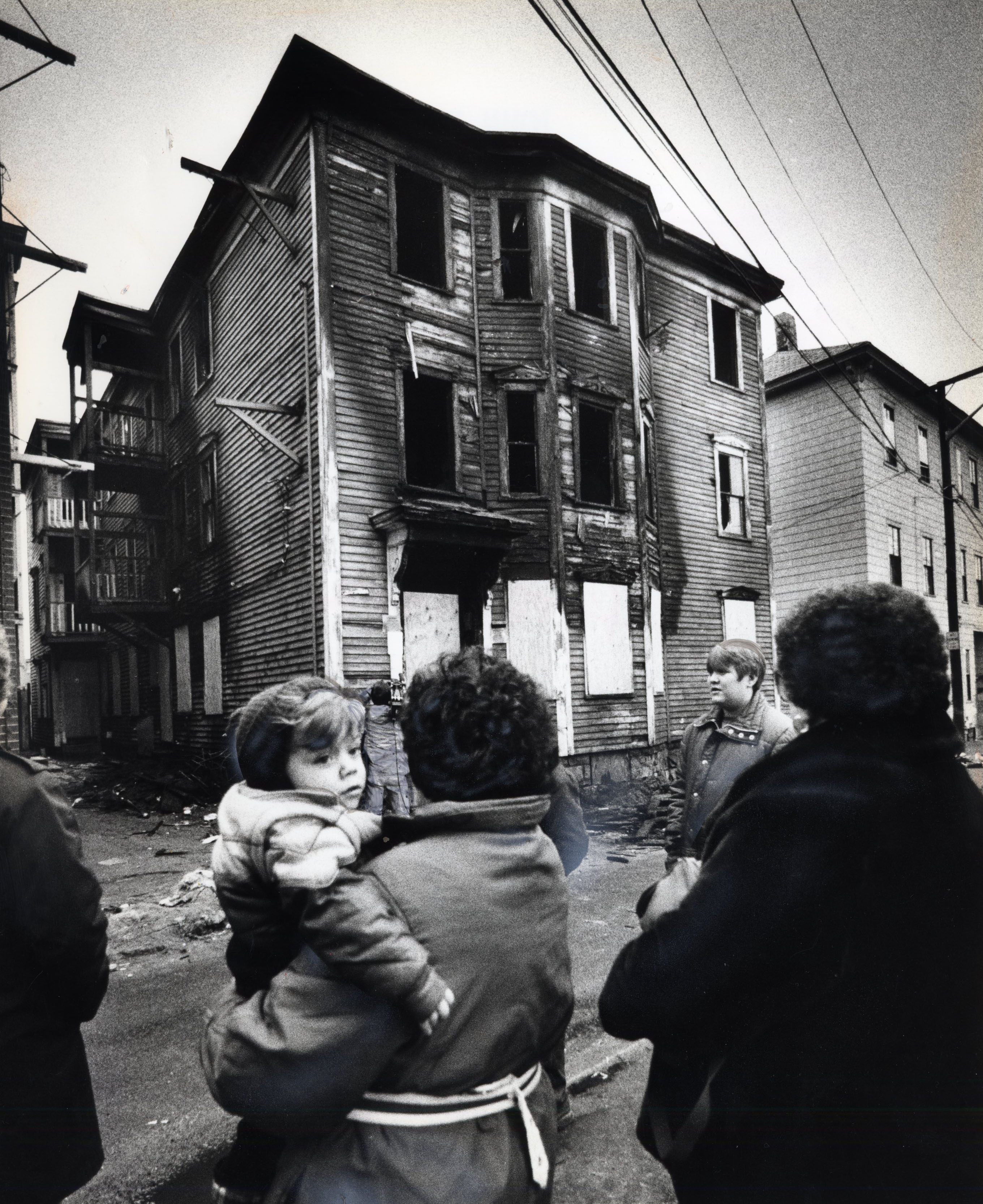 The burned-out Lowell house where eight people died.