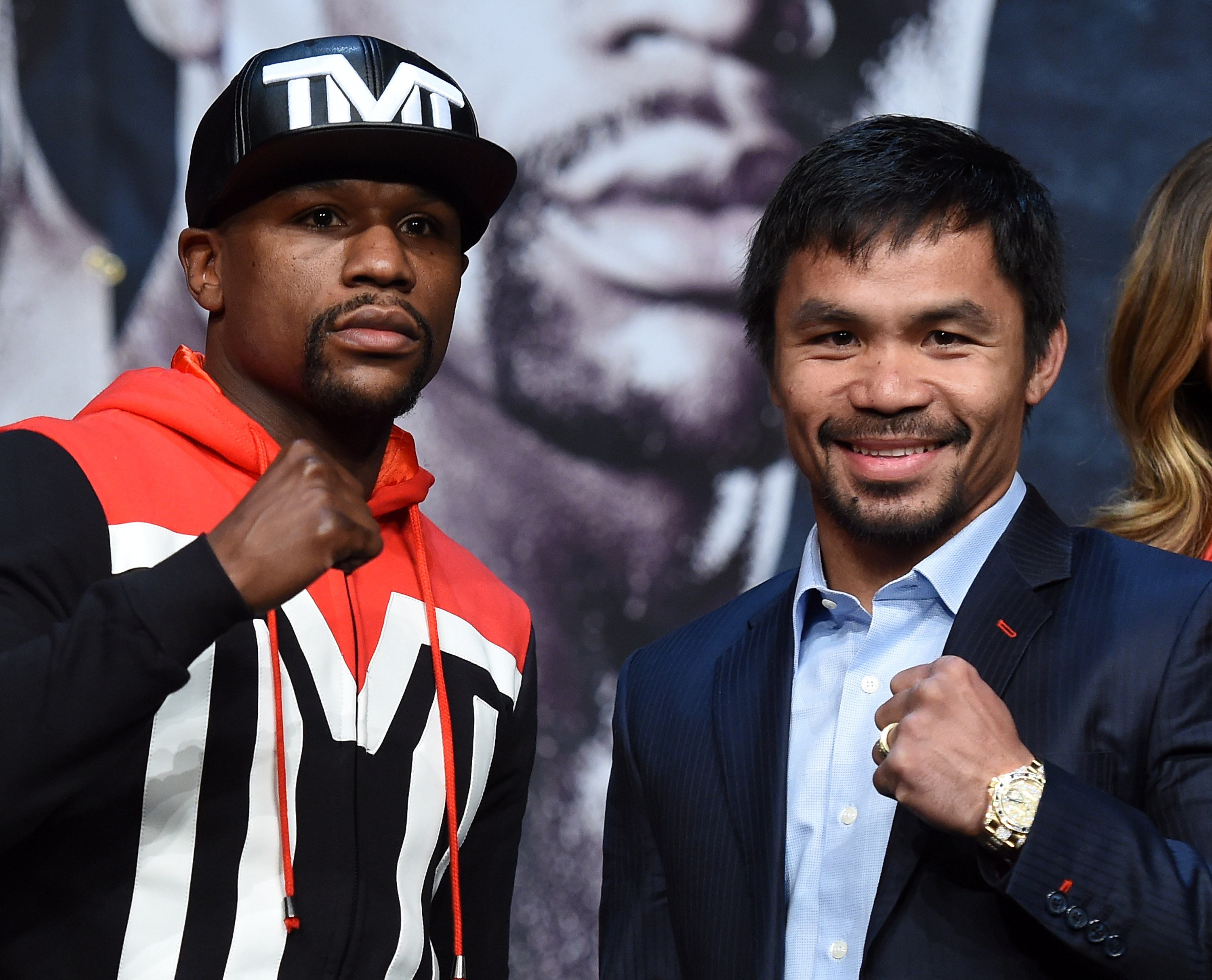 Floyd Mayweather (left) and Manny Pacquiao put it all on the line Saturday in boxing’s richest event.