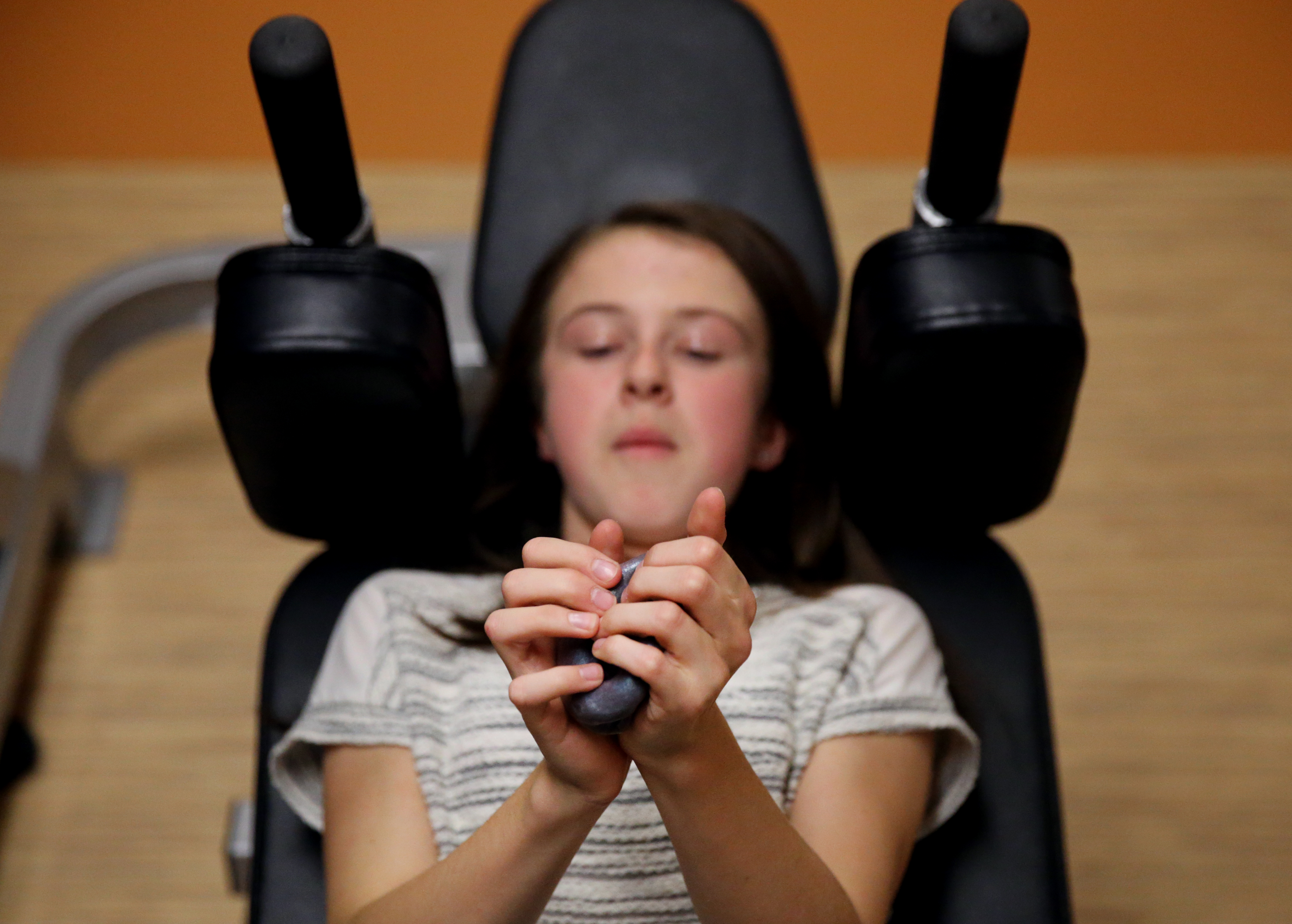 Sydney Durlach squeezed putty as a distraction from her pain during an appointment at Emerson Hospital.