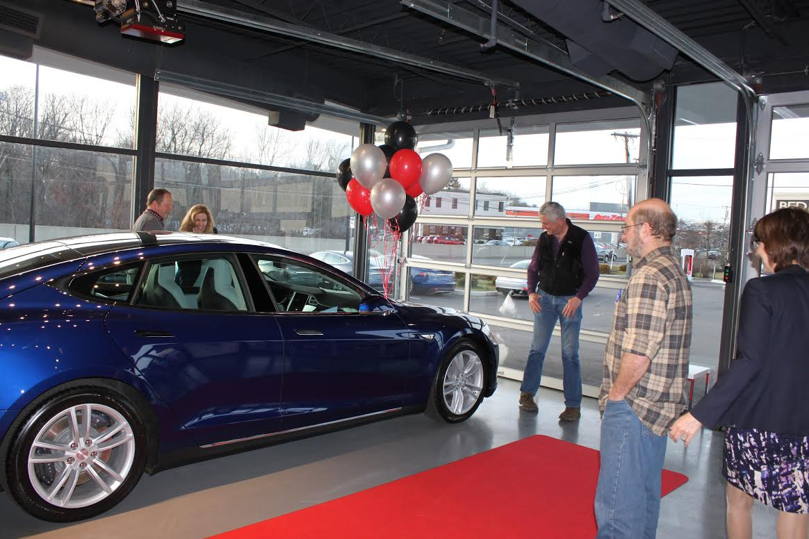 Al and Catherine Nierenberg received their Tesla at Tesla Motors in Dedham on March 16.