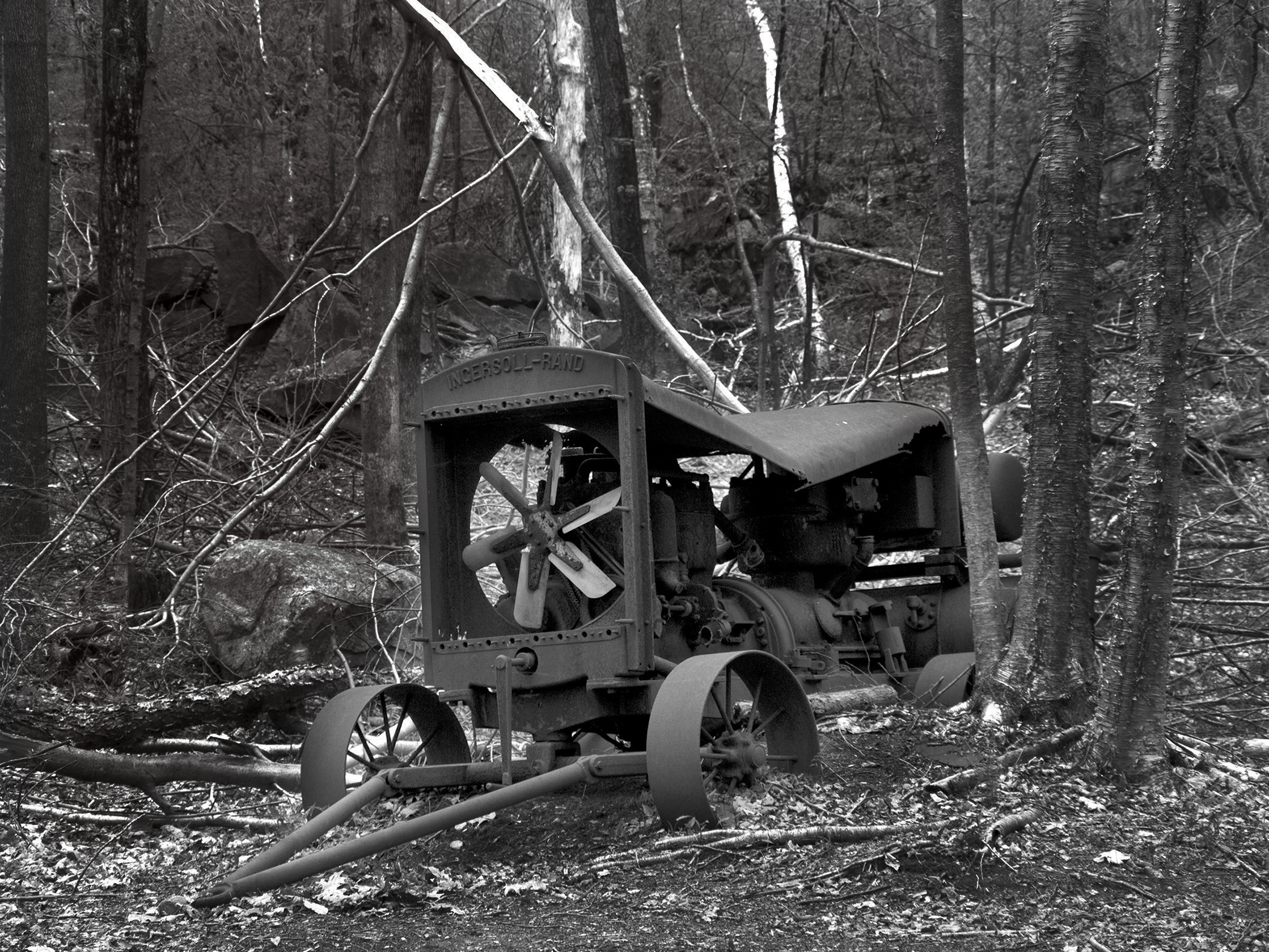 Abandoned equipment reminds hikers of its earlier use at the Becket Land Trust’s Quarry.