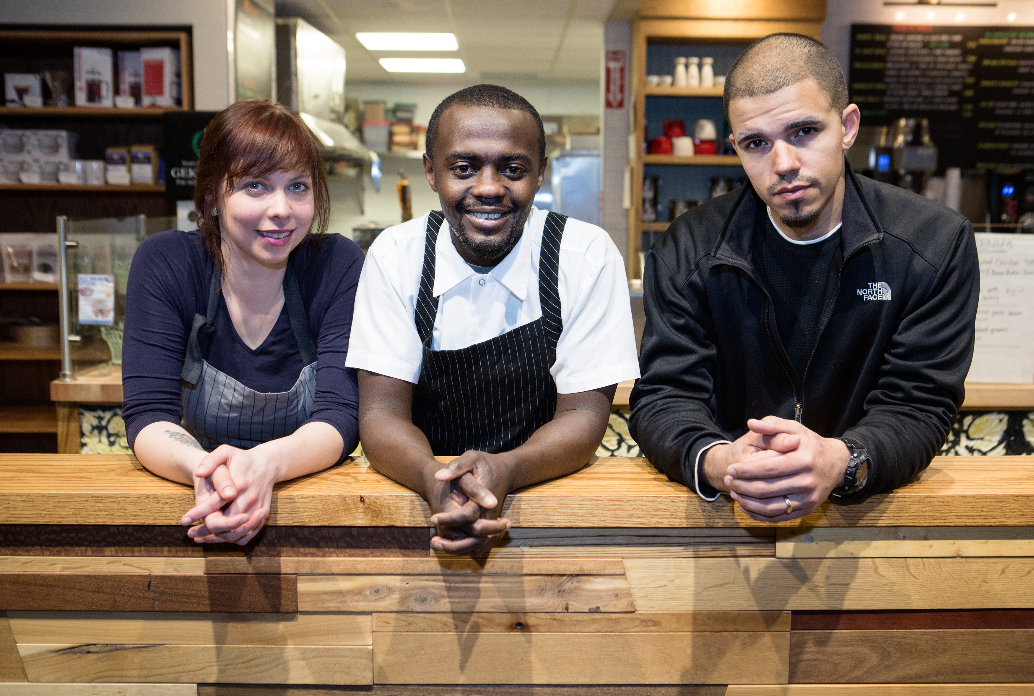 Sarah Trainer, Kwasi Kwaa (center), and Tim Ellis at Chop Bar.