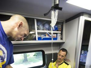 Navy SEAL Mike W. replenished his fluids during the triathlon with an IV.