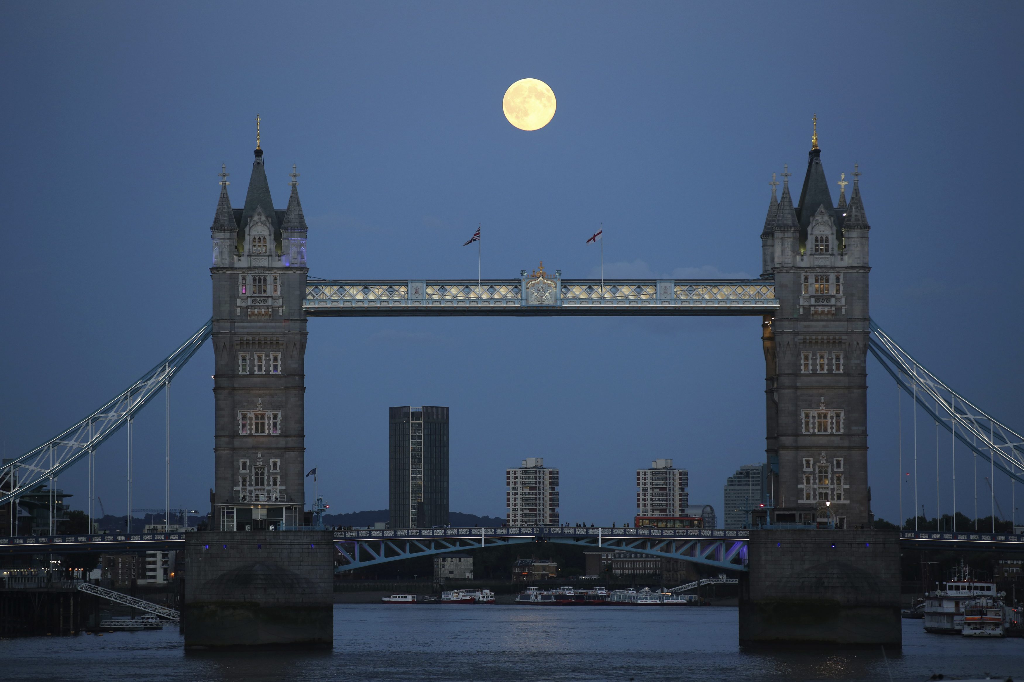 A supermoon rose over Tower Bridge in London.