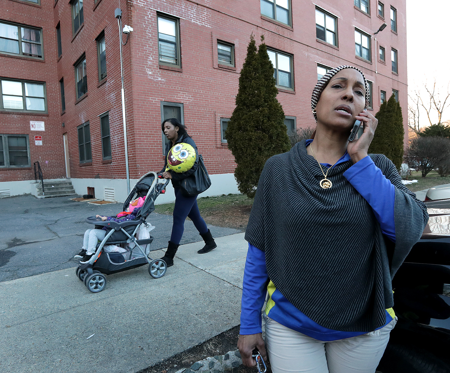 Yocasta Osorio outside her home at the Mildred C. Hailey Apartments in Jamaica Plain. Boston housing officials are seeking a private developer to help rebuild the development.