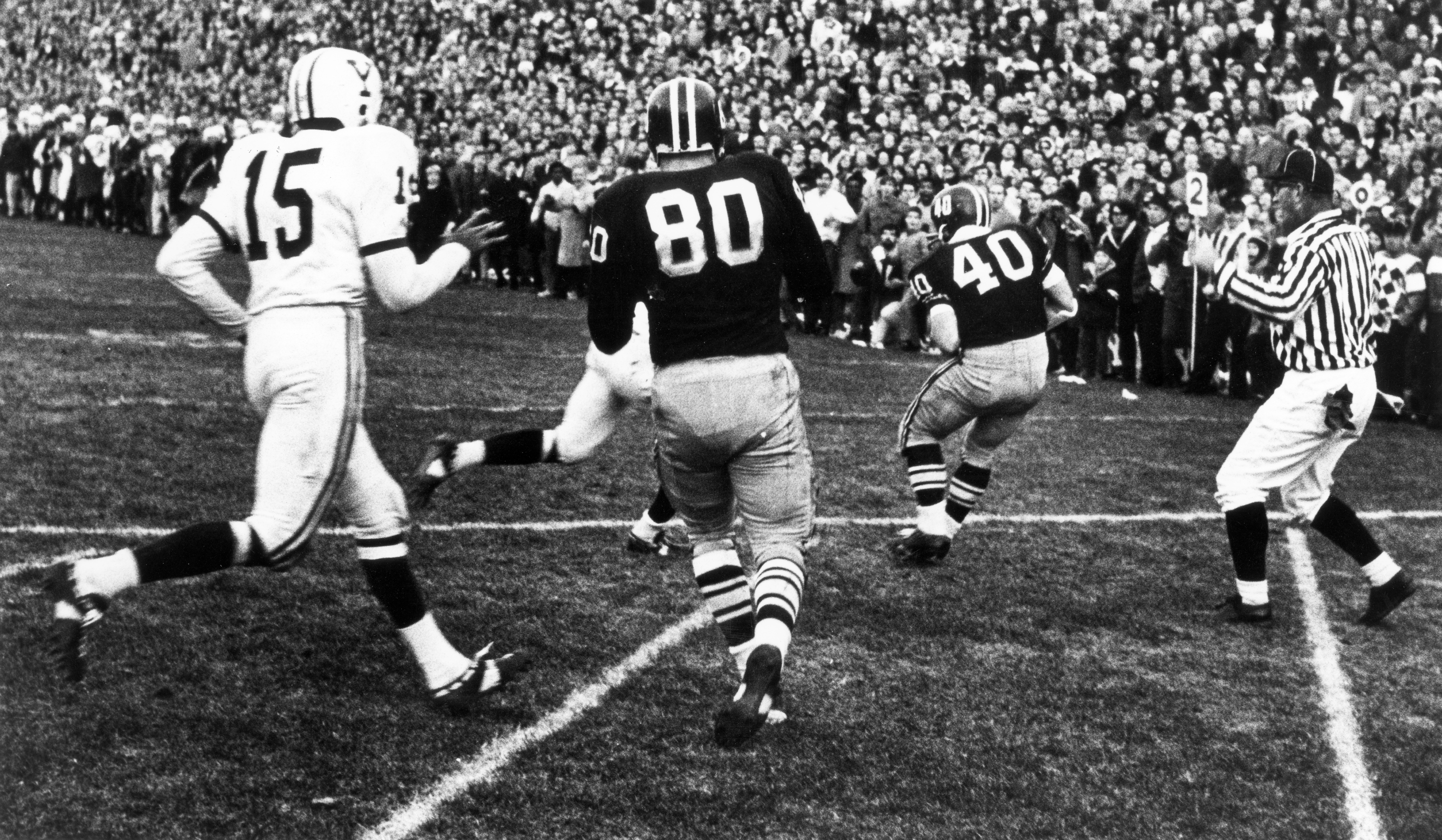 Gatto (right, No. 40) catches the TD pass as time expires.