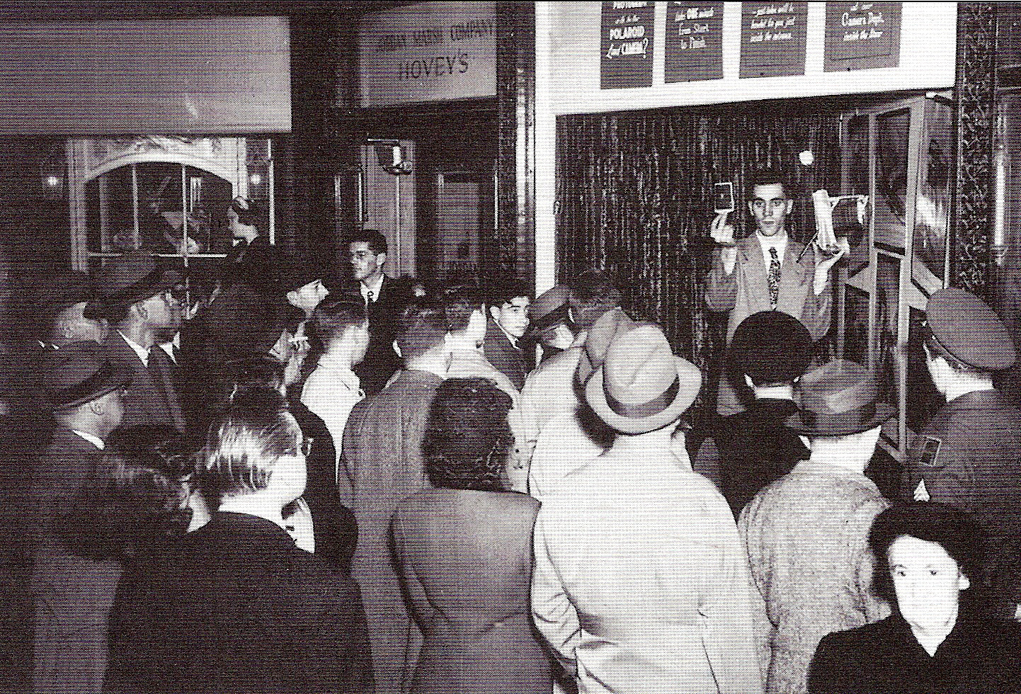 A Polaroid employee demonstrates the Model 95 at Jordan Marsh on the day it went on sale in 1948.