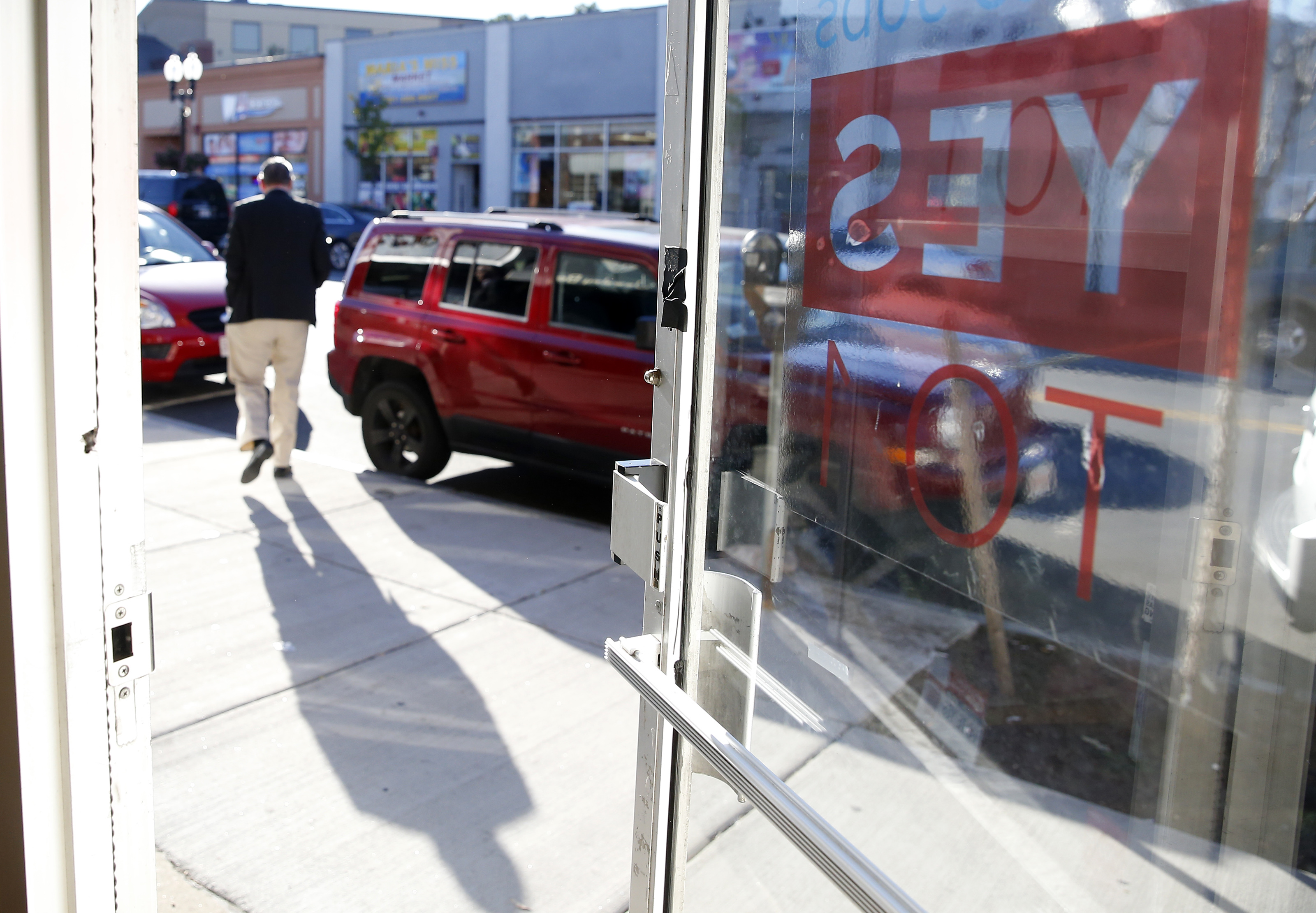 Eugene McCain, leaving his office in Revere, has launched local and statewide referendums in the hope of developing a slots casino near Suffolk Downs race track.