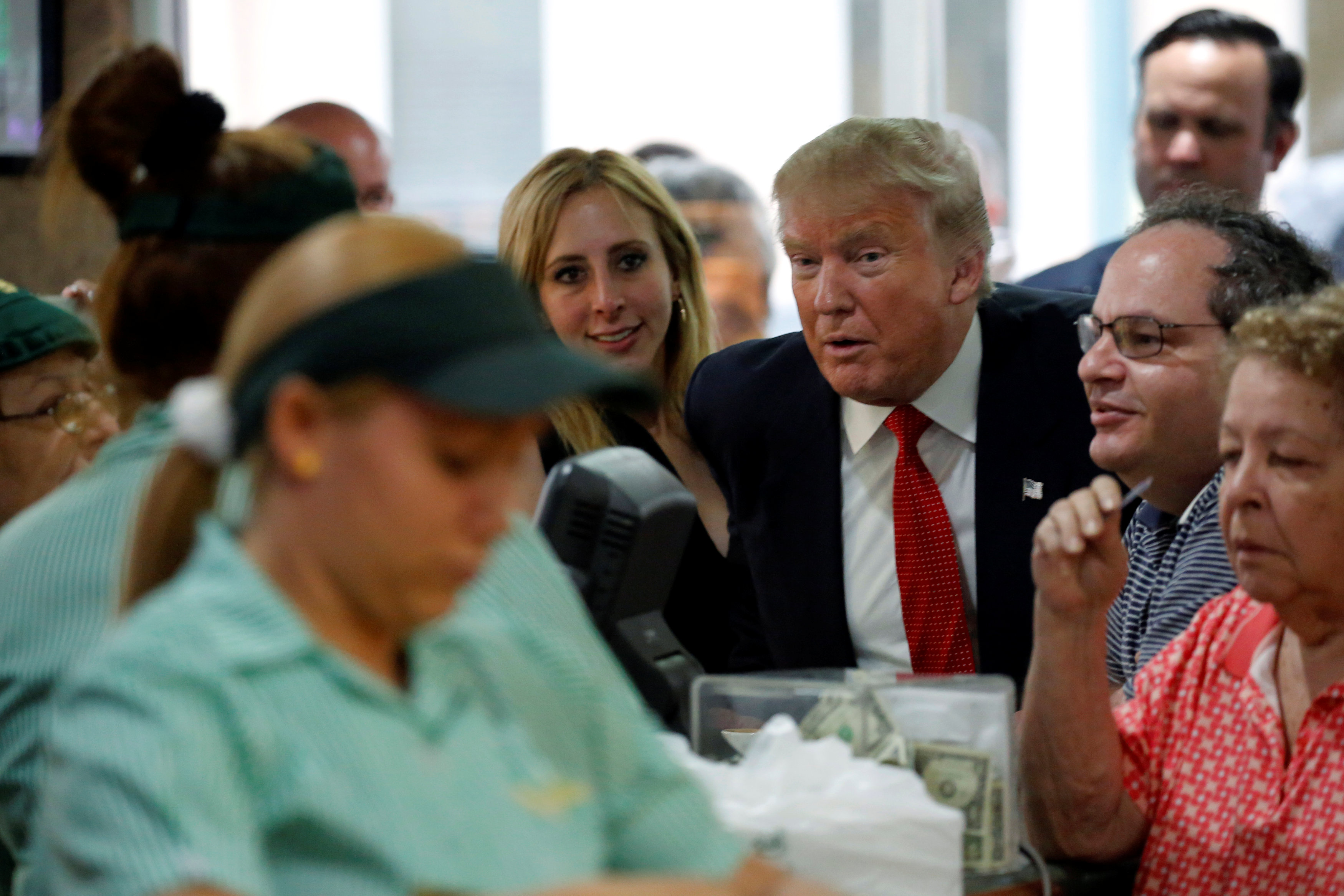 Donald Trump greeted employees Tuesday at Miami’s Versailles Bakery.