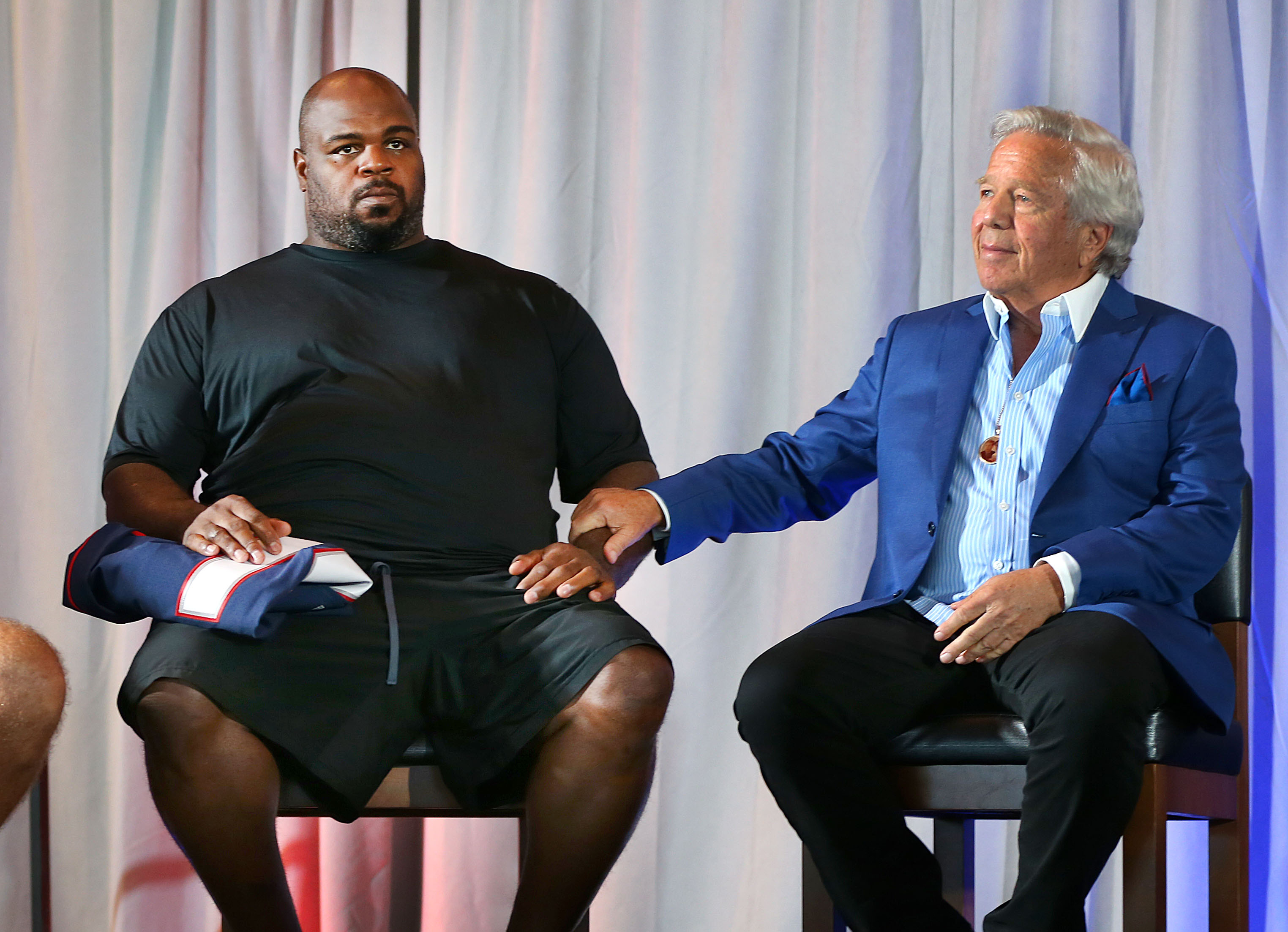 Kraft put his hand on Wilfork's forearm as a short video was shown before he spoke.
