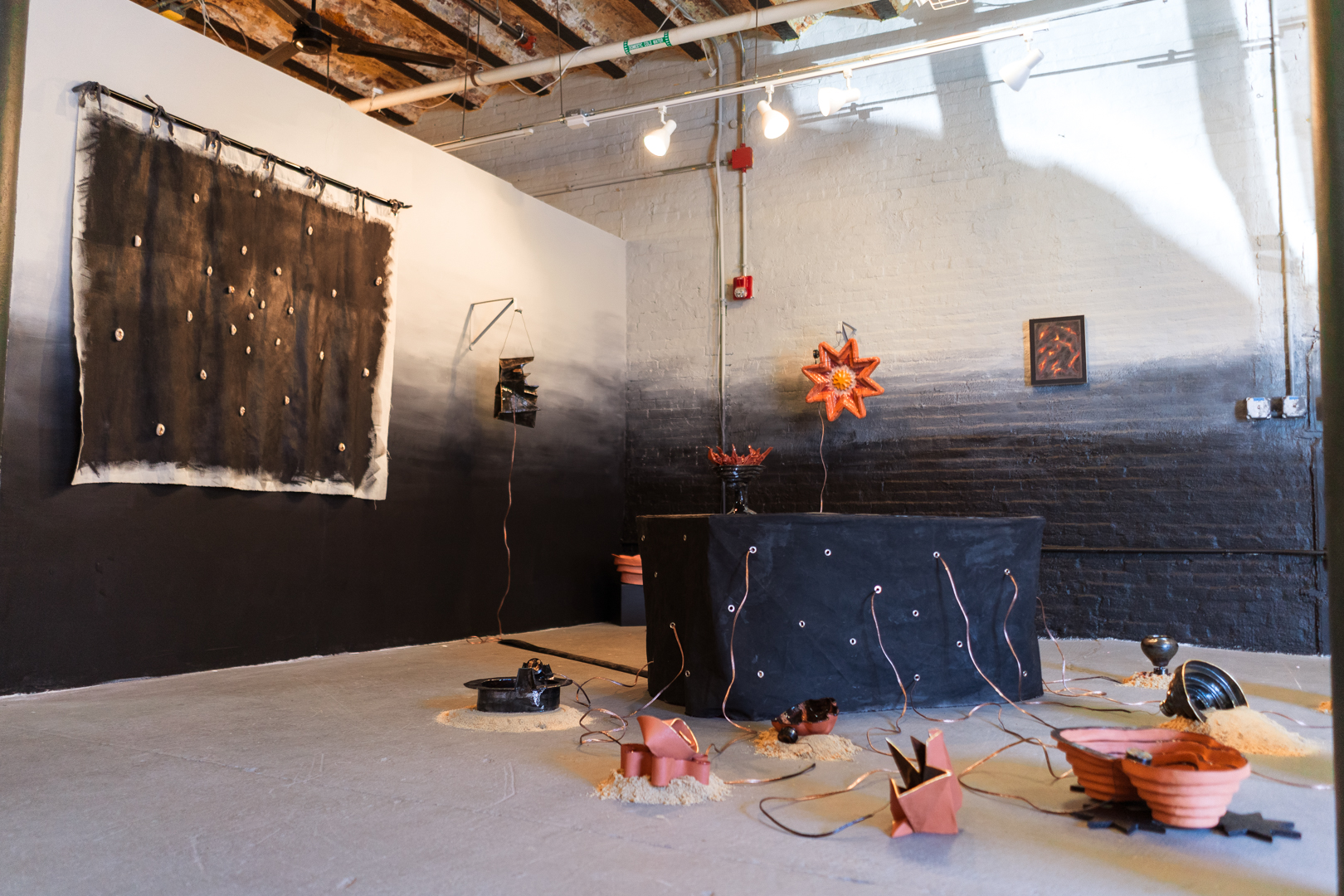 Erin Genia's "Sound Vessels" (2019) is in the foreground with "After Powhatan's Robe" (2018) in the background. (Photo by Erin Genia)