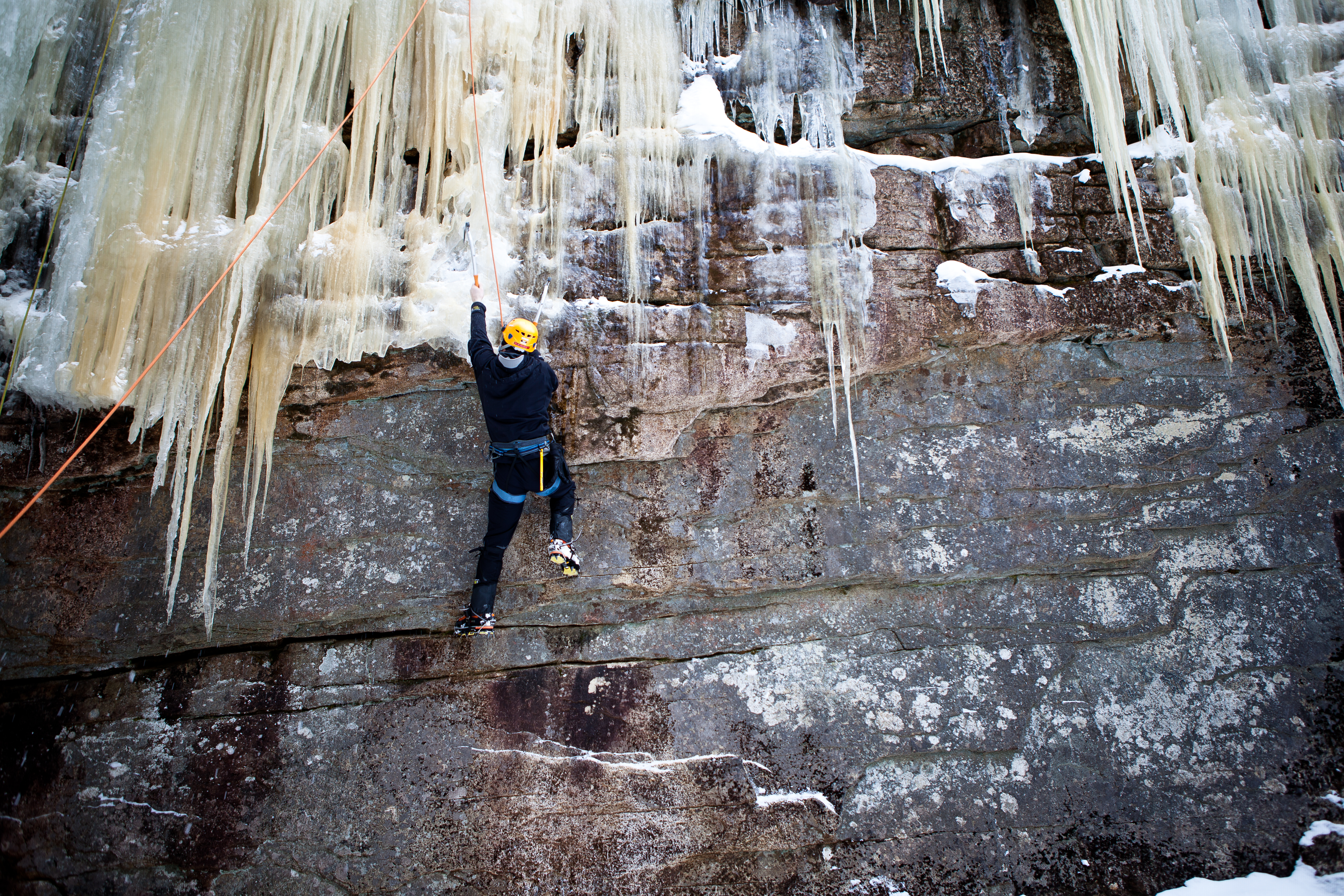 A climber ascends a ‘‘mixed climb,’’ which requires using tools to hook tiny rock edges.