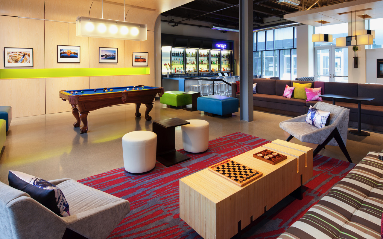 Grab a book, have a snack, or shoot some pool at the XYZ lounge at Aloft San Francisco.