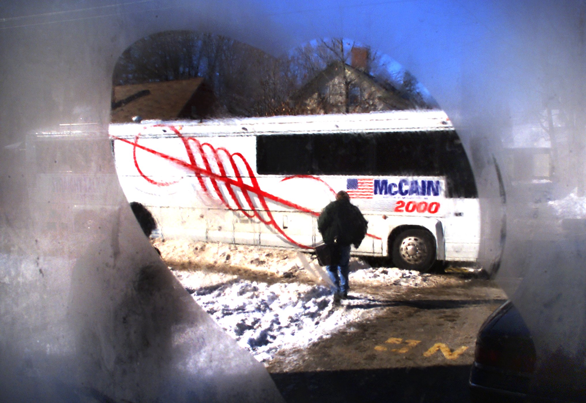 A John McCain campaign bus sat outside Exeter High School as McCain spoke inside.