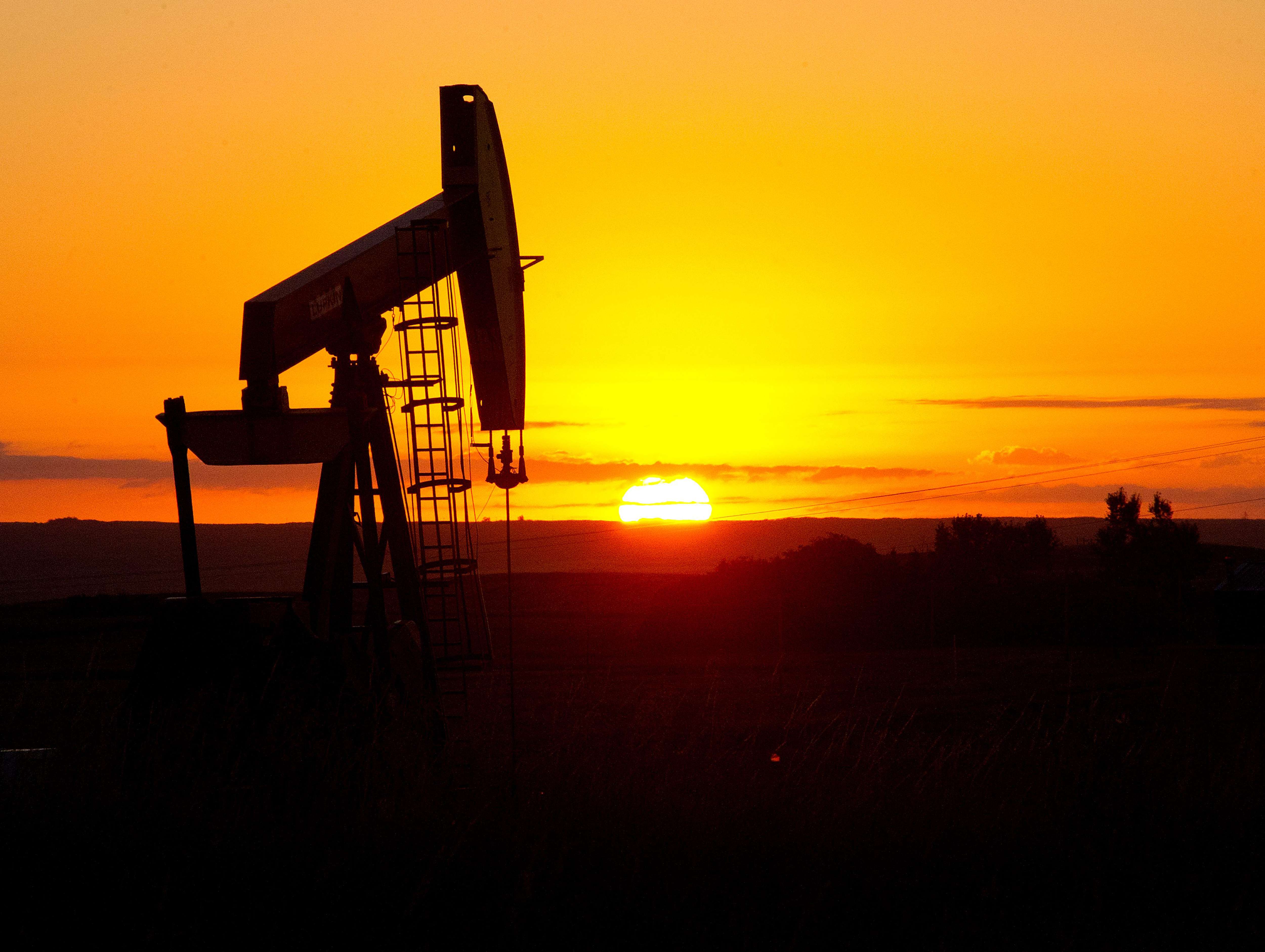 Crude oil gushing from shale fields in North Dakota is a major factor in the surge in domestic oil production. The surplus has led to a debate over whether it is time to lift US restrictions on oil exports.