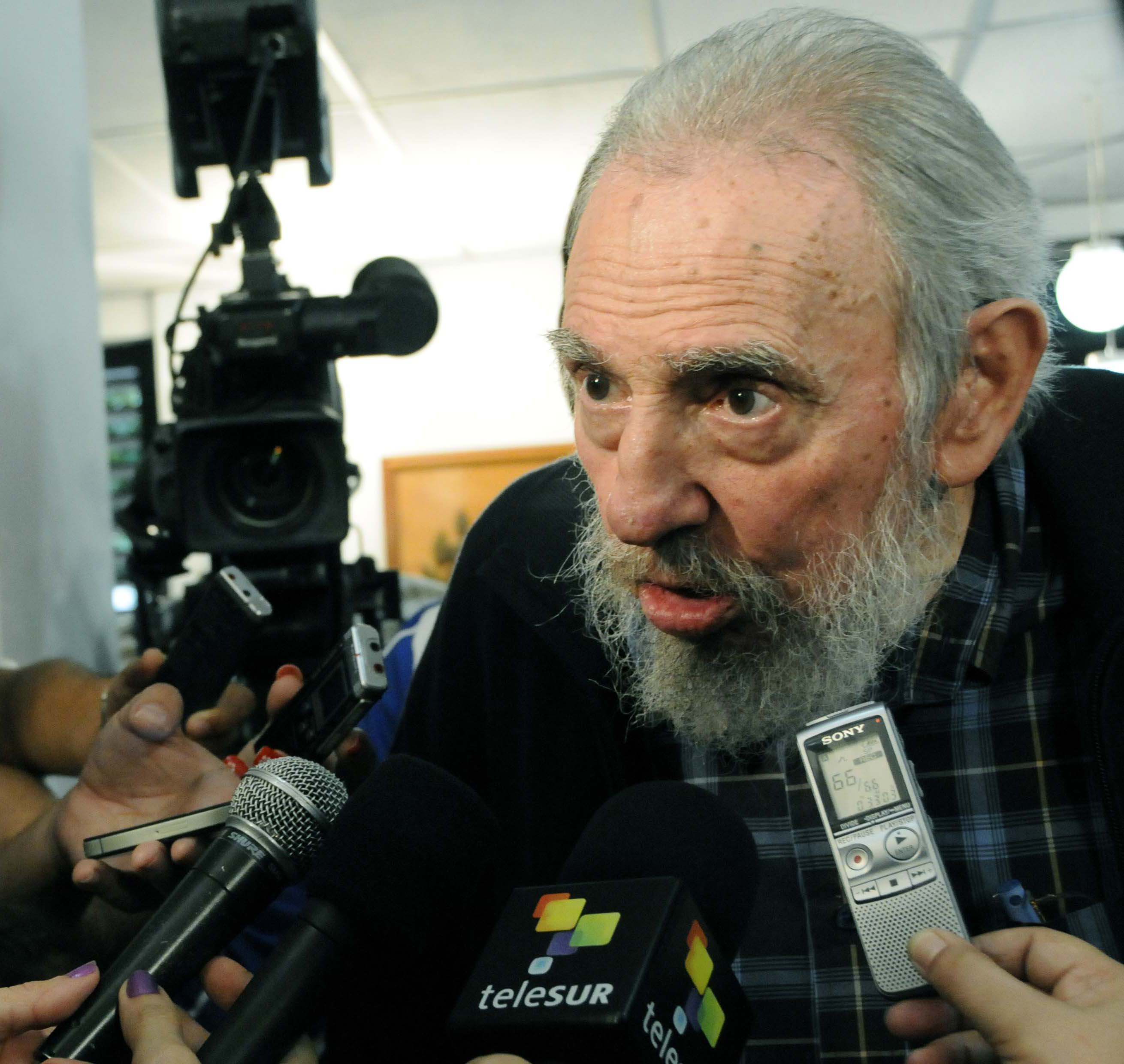 Fidel Castro, 86, speaks to reporters at a polling station in Havana Feb. 3.
