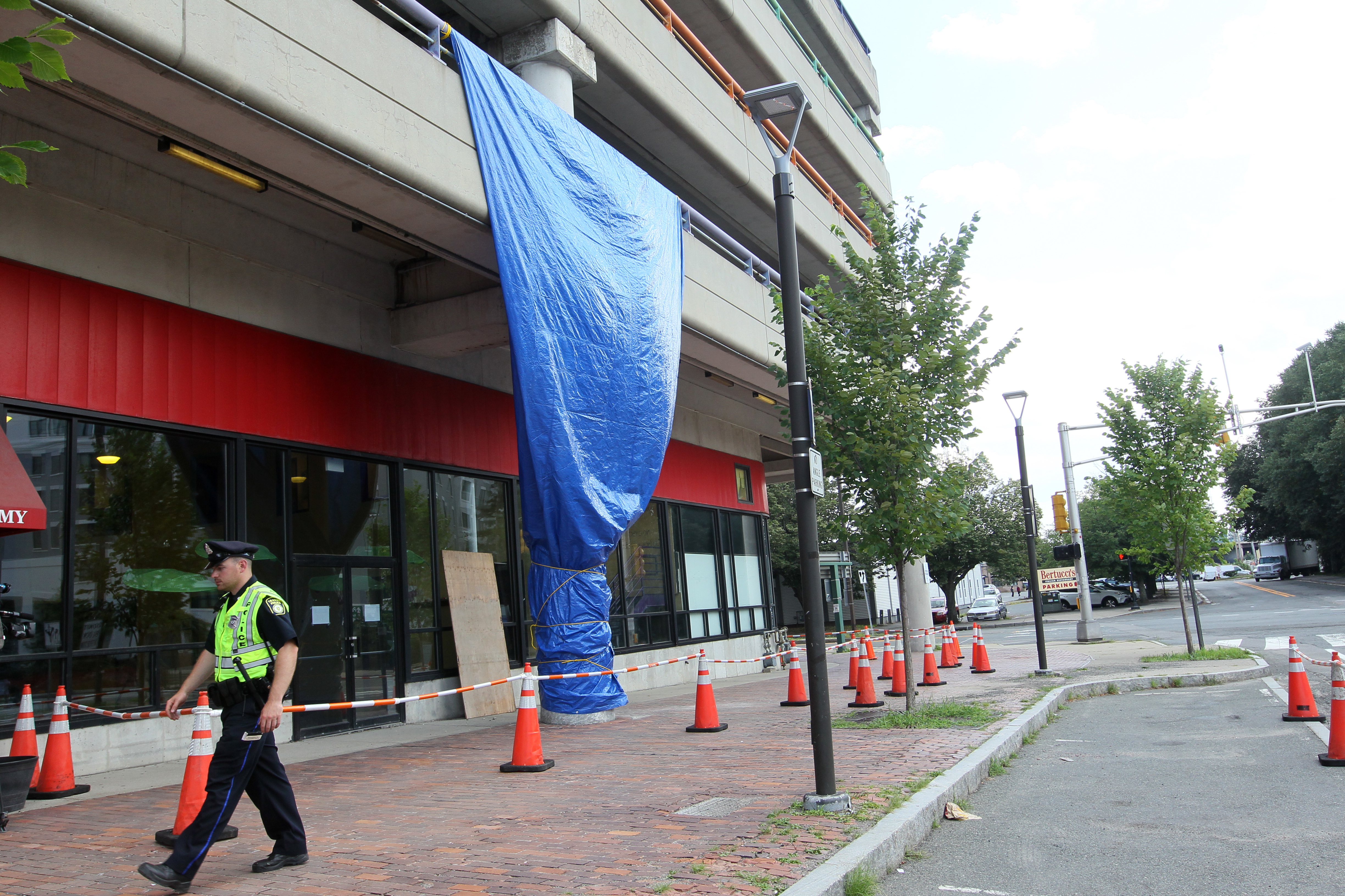 A blue tarp hung in front of the Alewife garage.