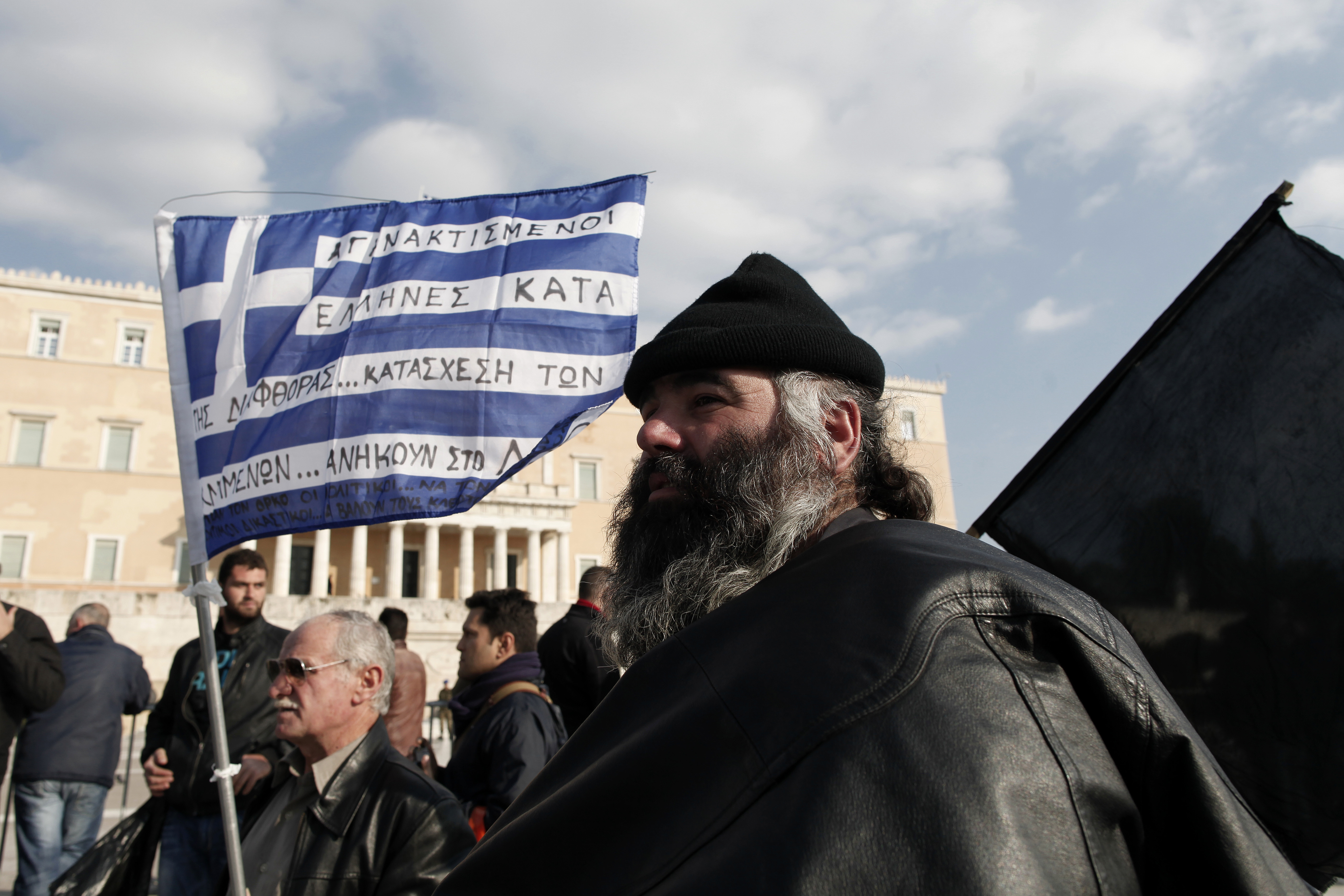 After Greece instituted tax hikes, demonstrators rallied outside Parliament against the increases, claiming that they were being driven out of business.