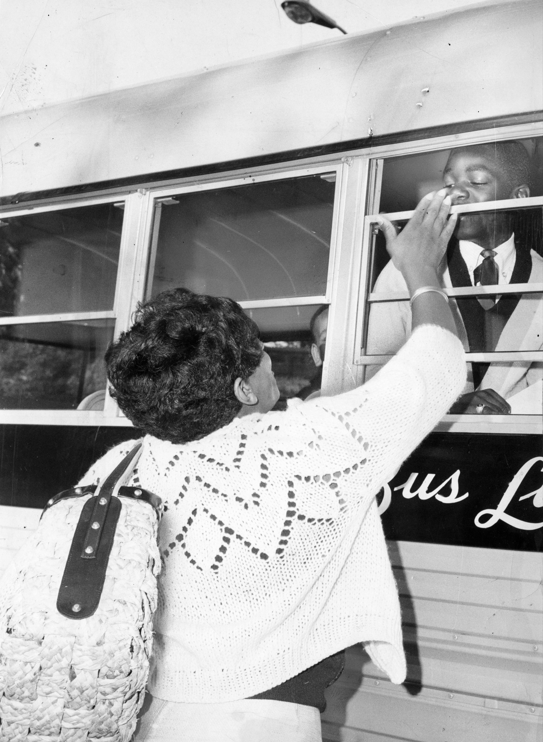Joan McLarin says a last minute goodbye to her eighth grade son, Milton, as his bus leaves for Braintree Jr. High School on Sept. 7, 1966, the first day of the voluntary busing program sponsored by METCO.