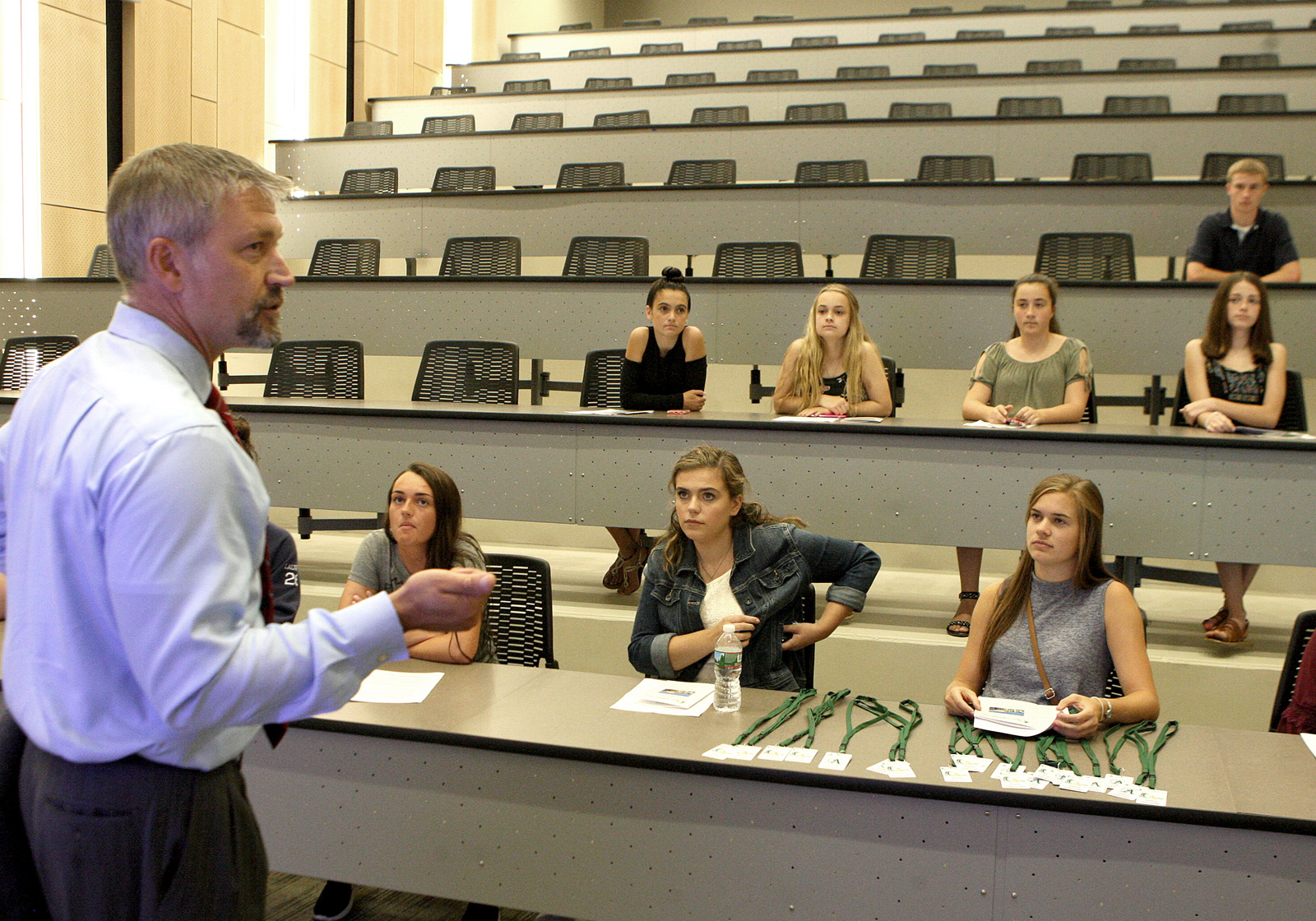 Superintendent Peter Schafer talks to student ambassadors in the seminar room.