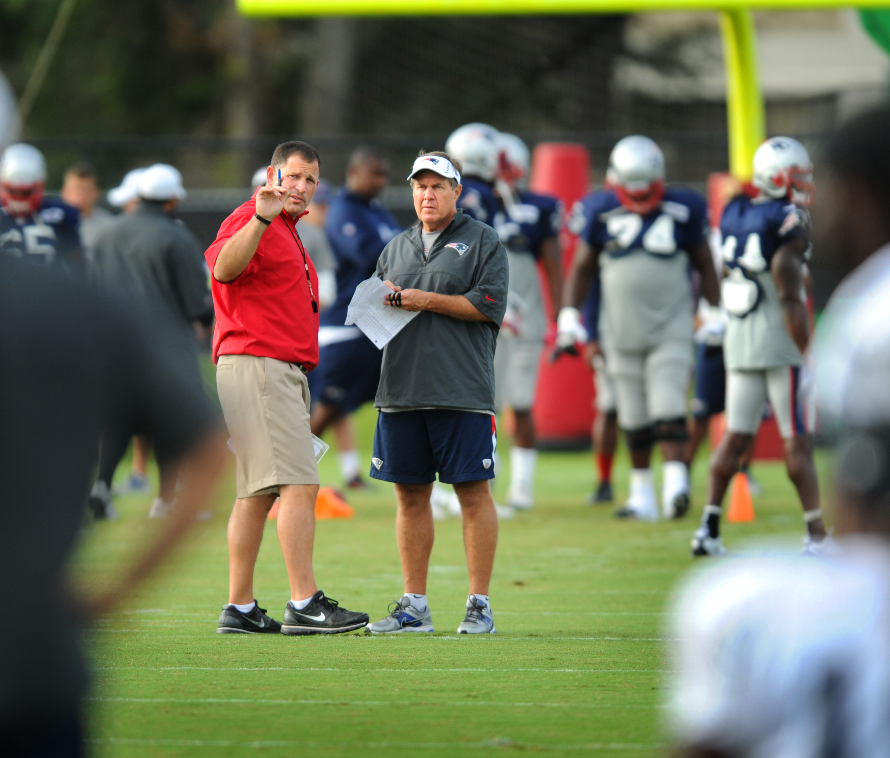 Schiano with Bill Belichick during a 2012 joint practice during training camp.