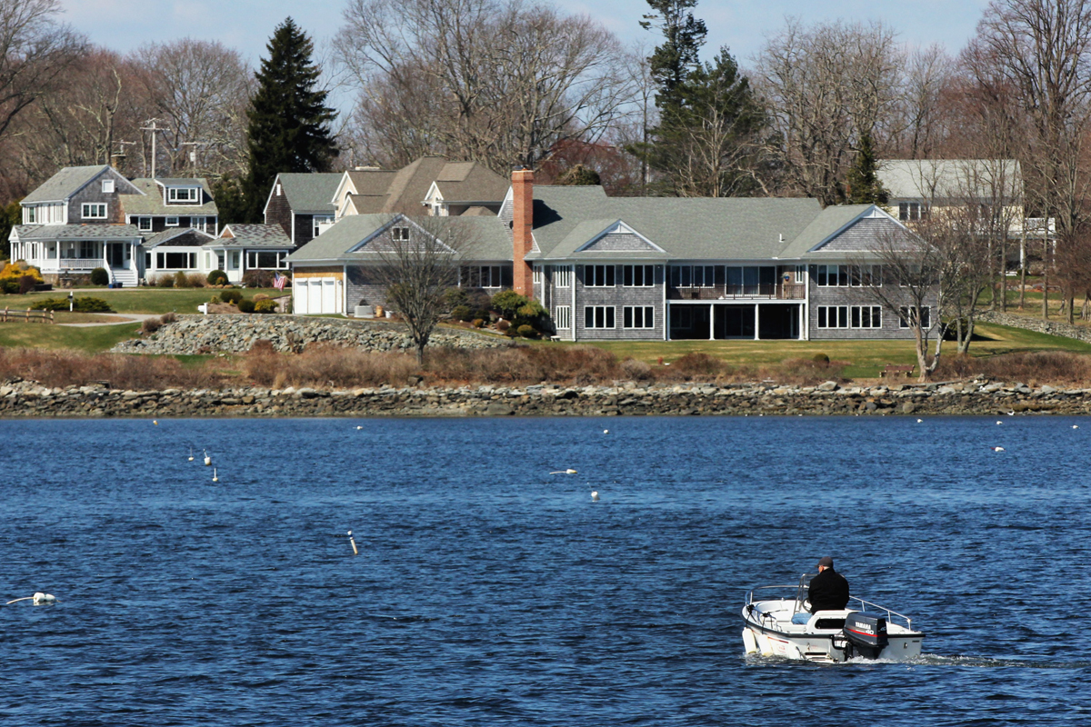 The ocean vista from homes on Poppasquash Road in a wealthier section of town.