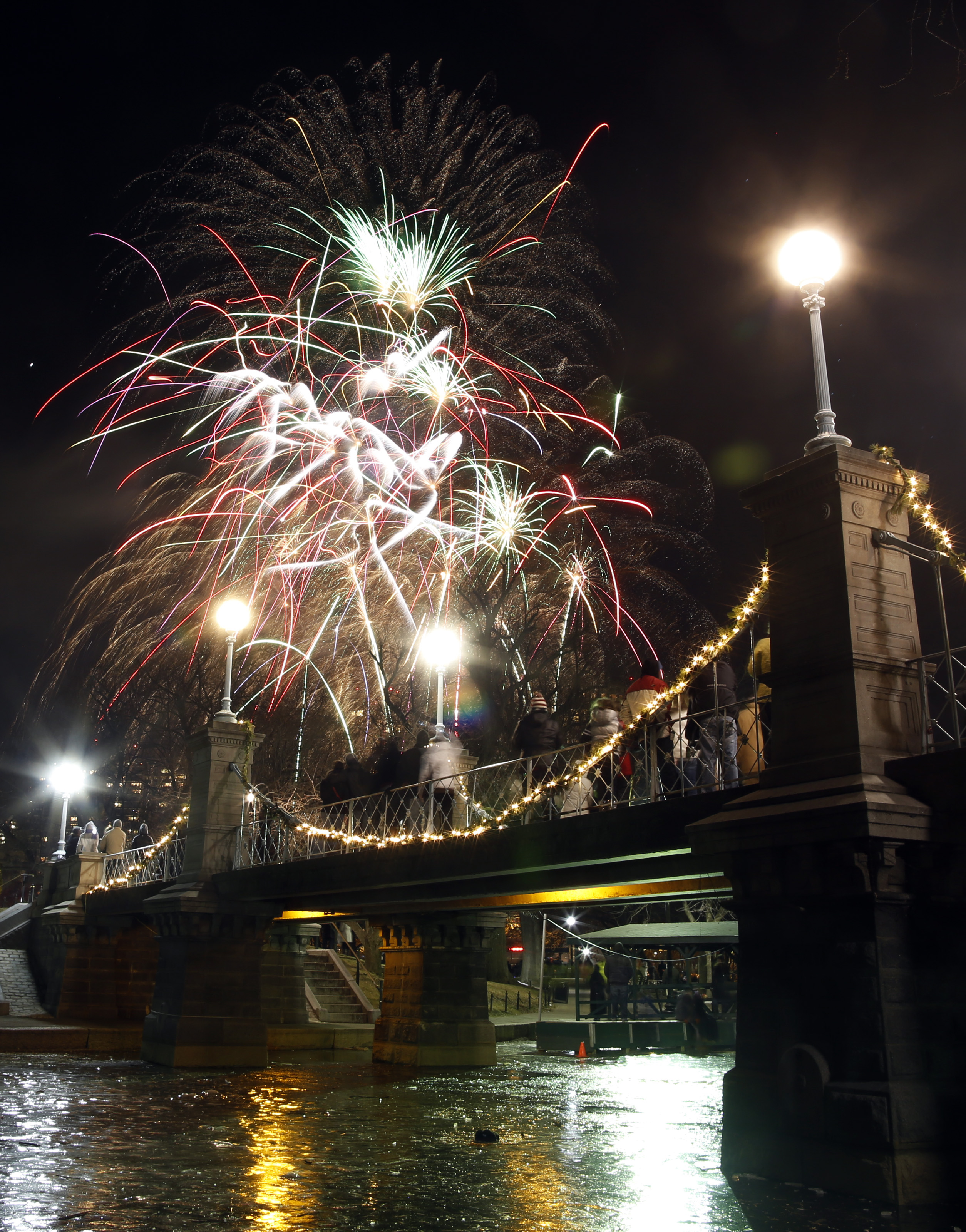 Early-evening fireworks over the Public Garden.