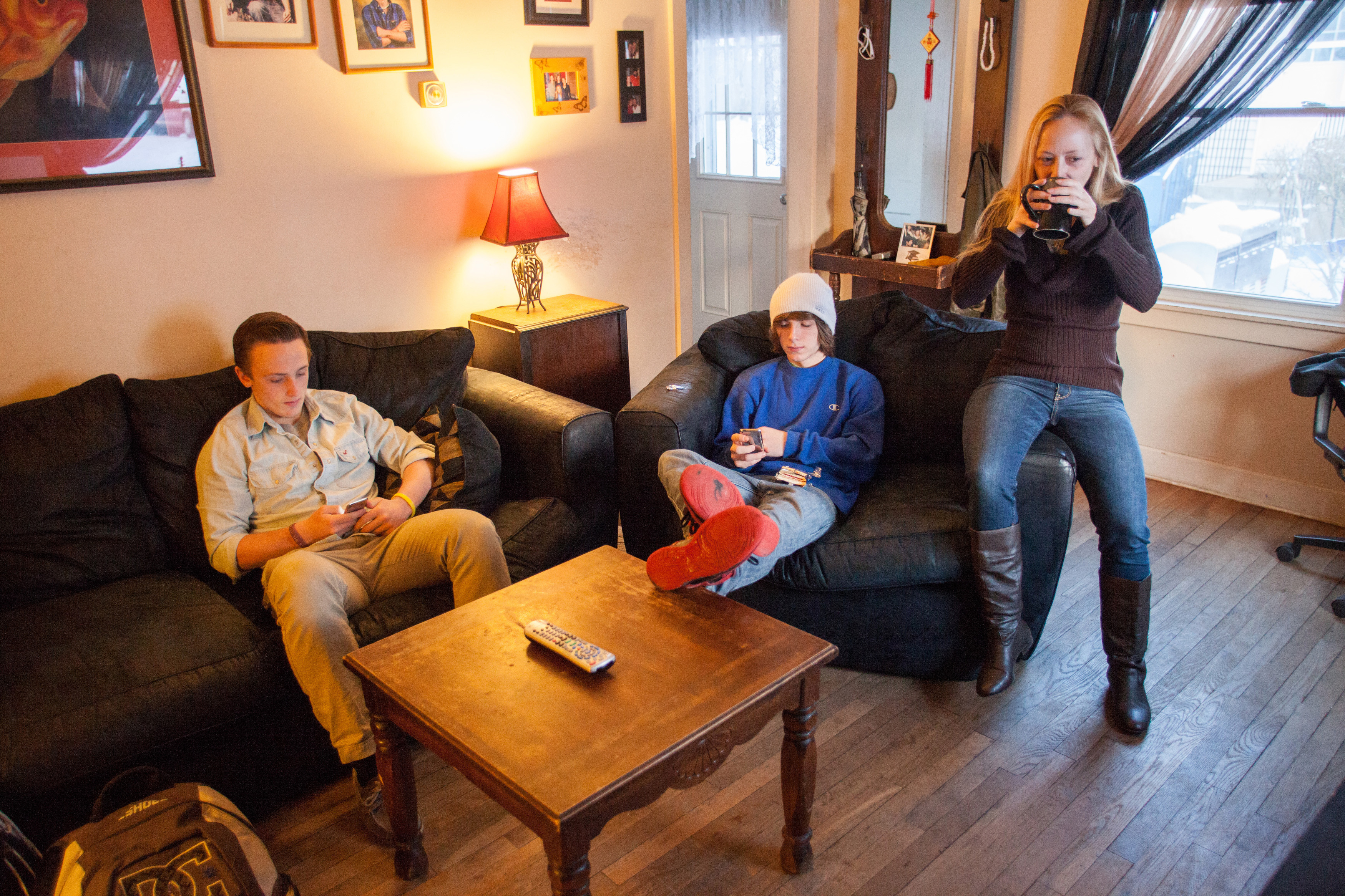 Keri-Ann Aubin, mother of teenagers Steven Ranney (left) and Kevin Ranney, struggles even with a Smith College degree.