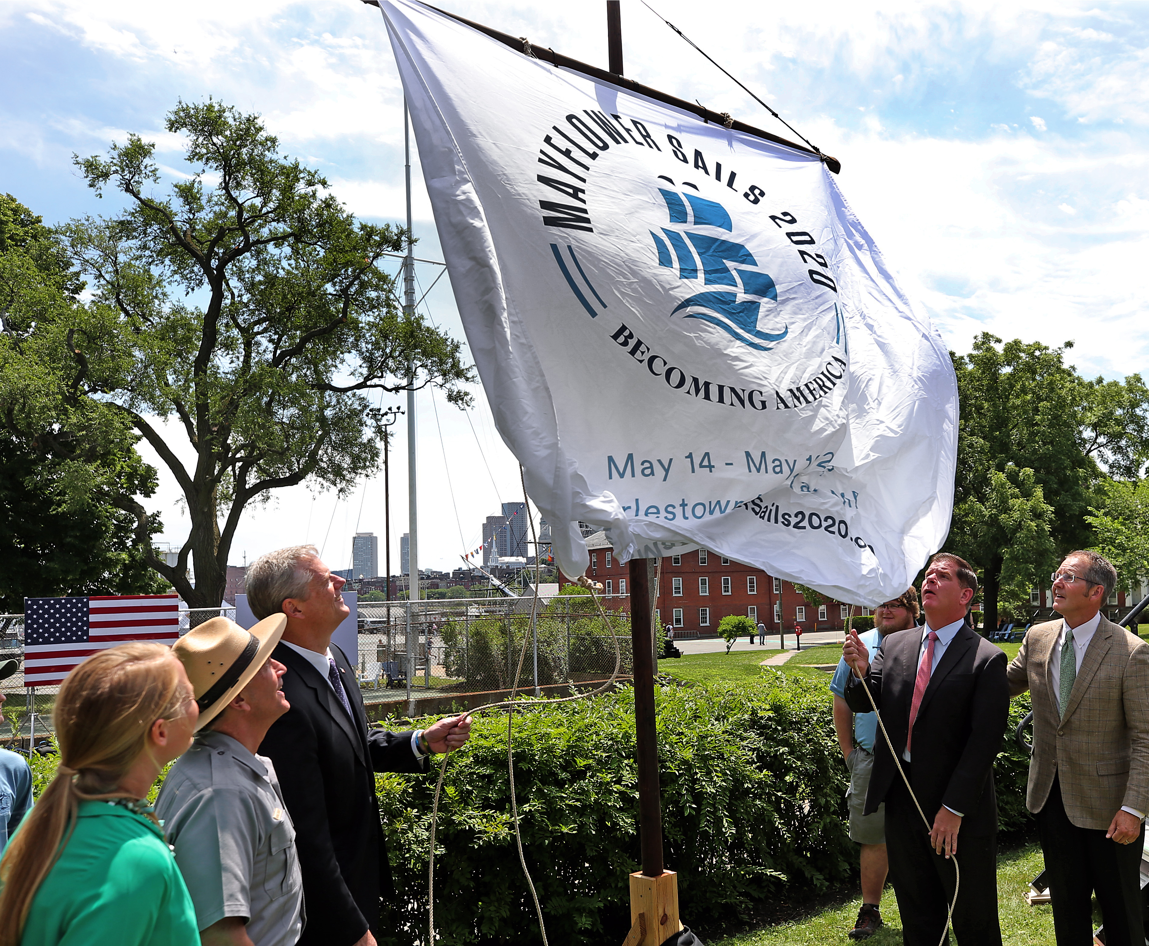 Magan Munson, CEO of Mayflower Sails 2020; Michael Creasey, National Parks of Boston superintendent; Governor Charlie Baker; Boston Mayor Martin J. Walsh; and Stephen Brodeur, chairman and founding sponsor of the Mayflower Sails 2020, gathered at the Charlestown Navy Yard on Monday to herald a celebration in 2020 of the Mayflower replica’s multi-million dollar restortion.