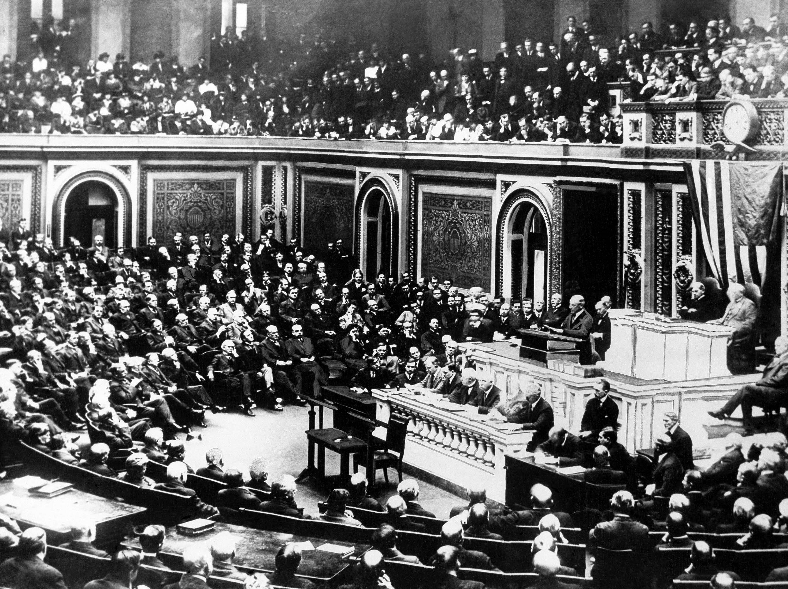 Woodrow Wilson delivers a declaration of war to a joint session of Congress.