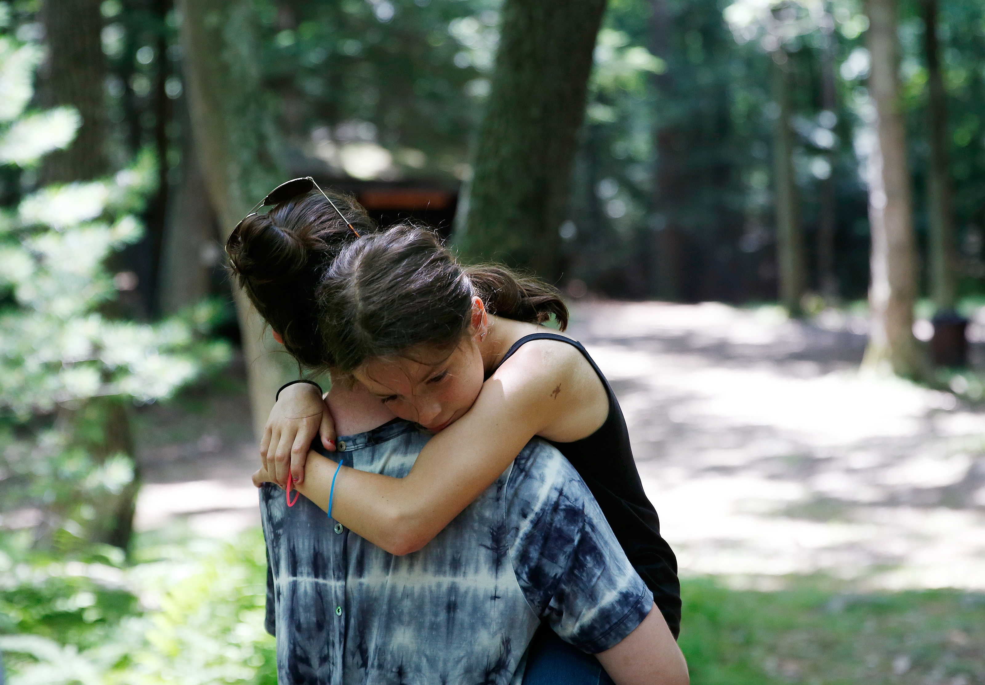 Pandiani carried camper Nevaeh Abustan back from the ropes course. Kelsey said that after her own first summer as a camper, “I wasn’t asking, ‘Why me?’ anymore.”